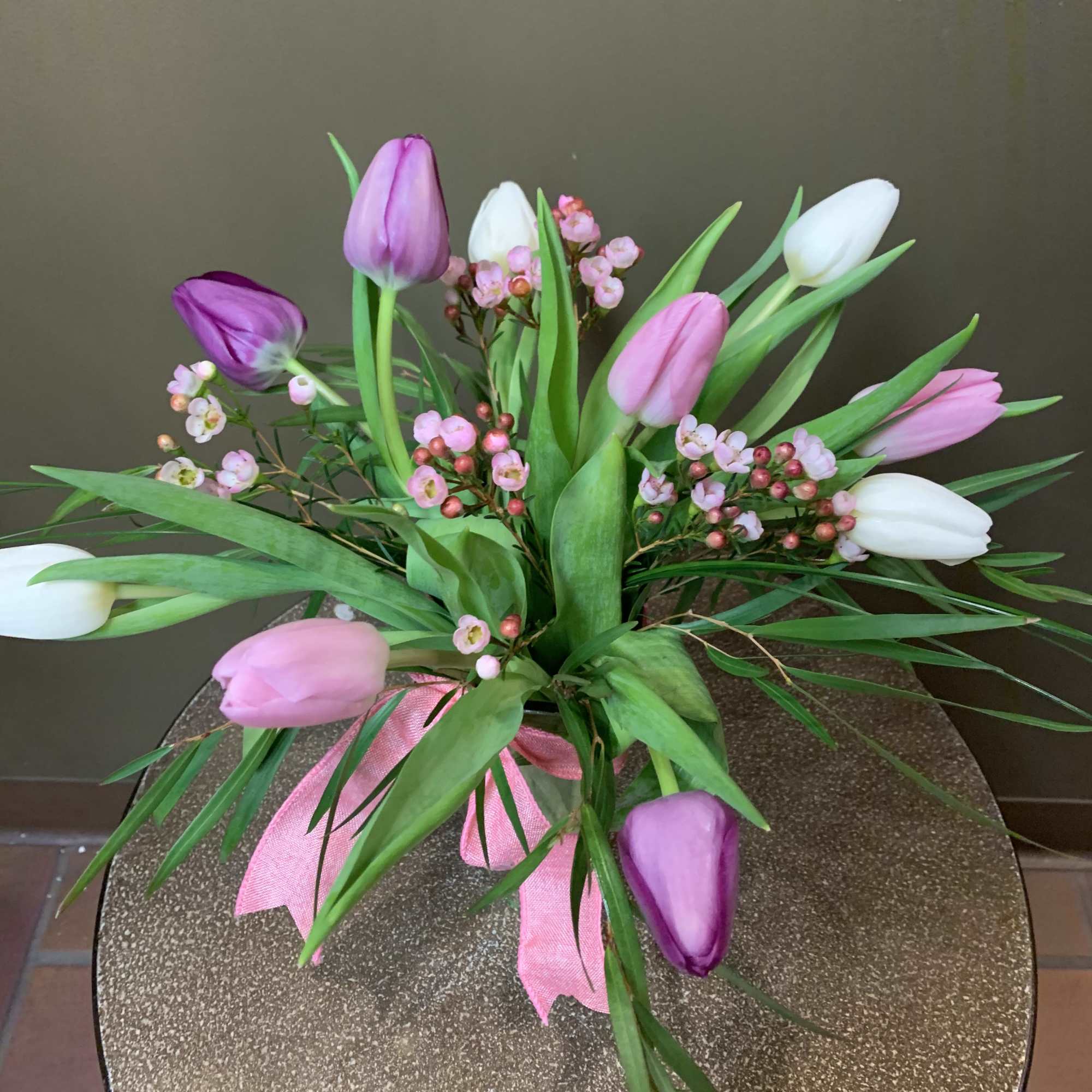 Nothing says come on spring like 10 tulips arranged in a vase.