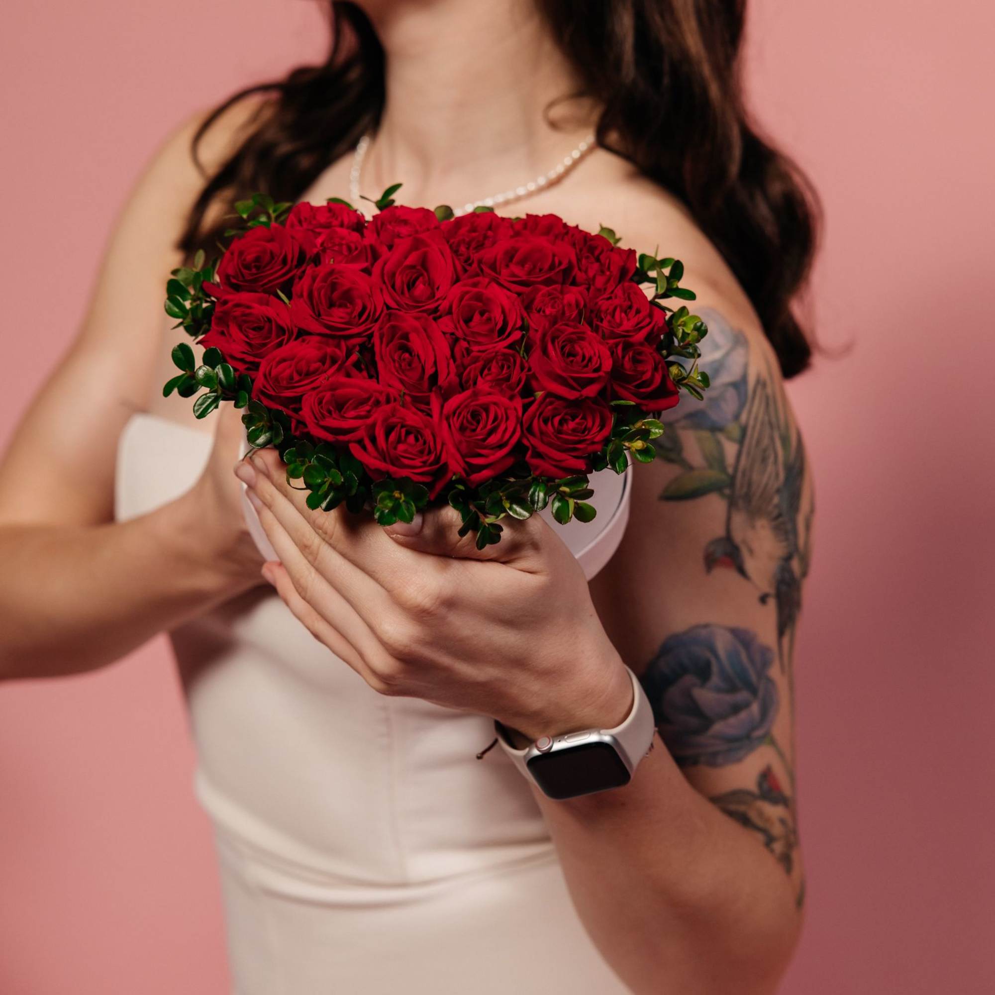 Scarlet Promise is a classic heart-shaped arrangement made of rich, velvety red