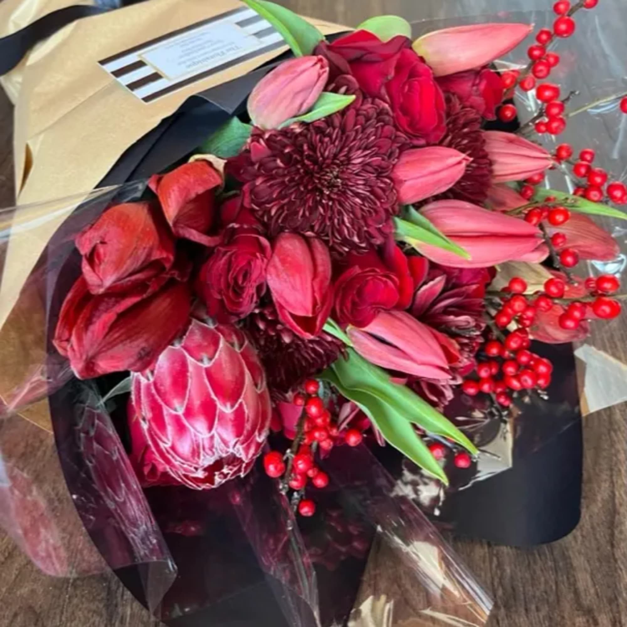 Send some love and cheer with this bold red bouquet of seasonal