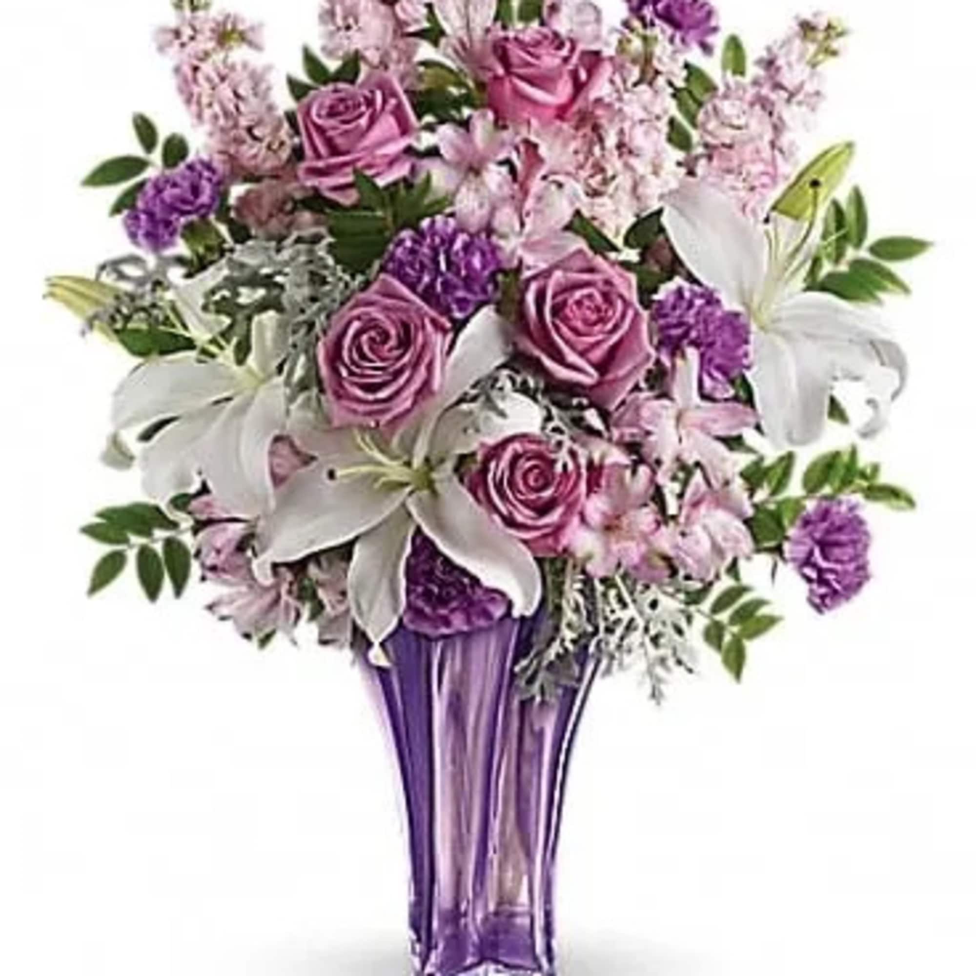 Lush and lovely, this deluxe bouquet lavishes her with love! Pure white