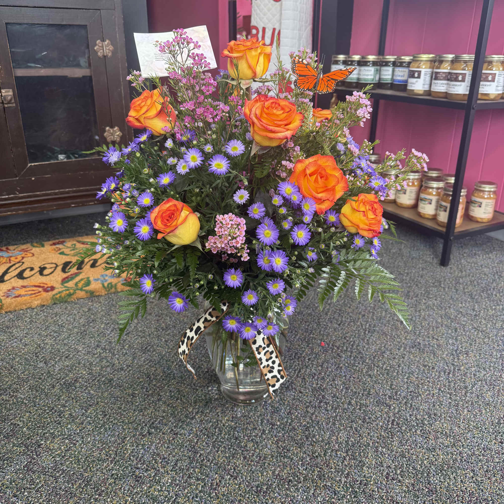 12 Roses in a vase with Filler
Please call for a certain color