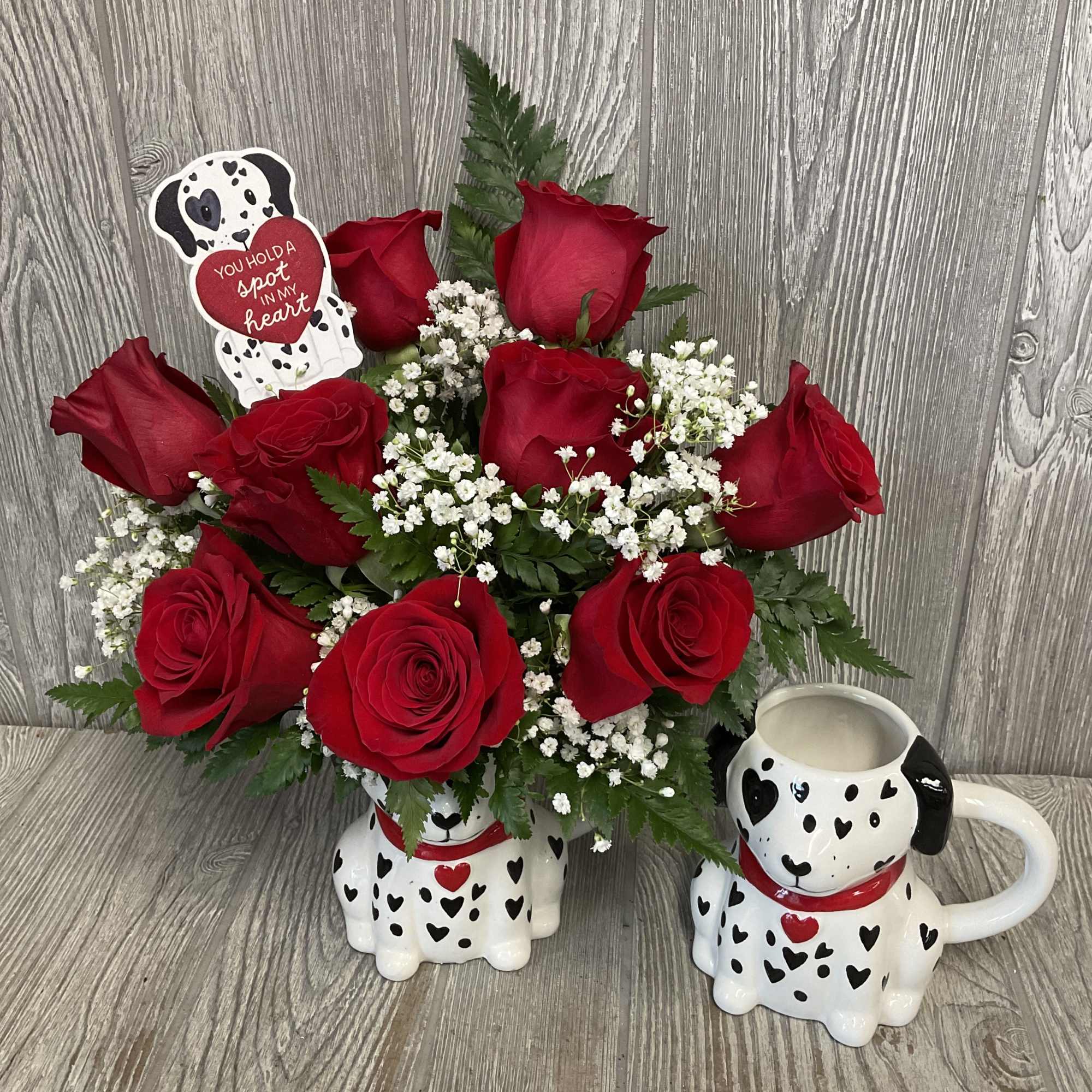 Beautiful fresh cut red roses arranged in an adorable keepsake ceramic Valentine&rsquo;s