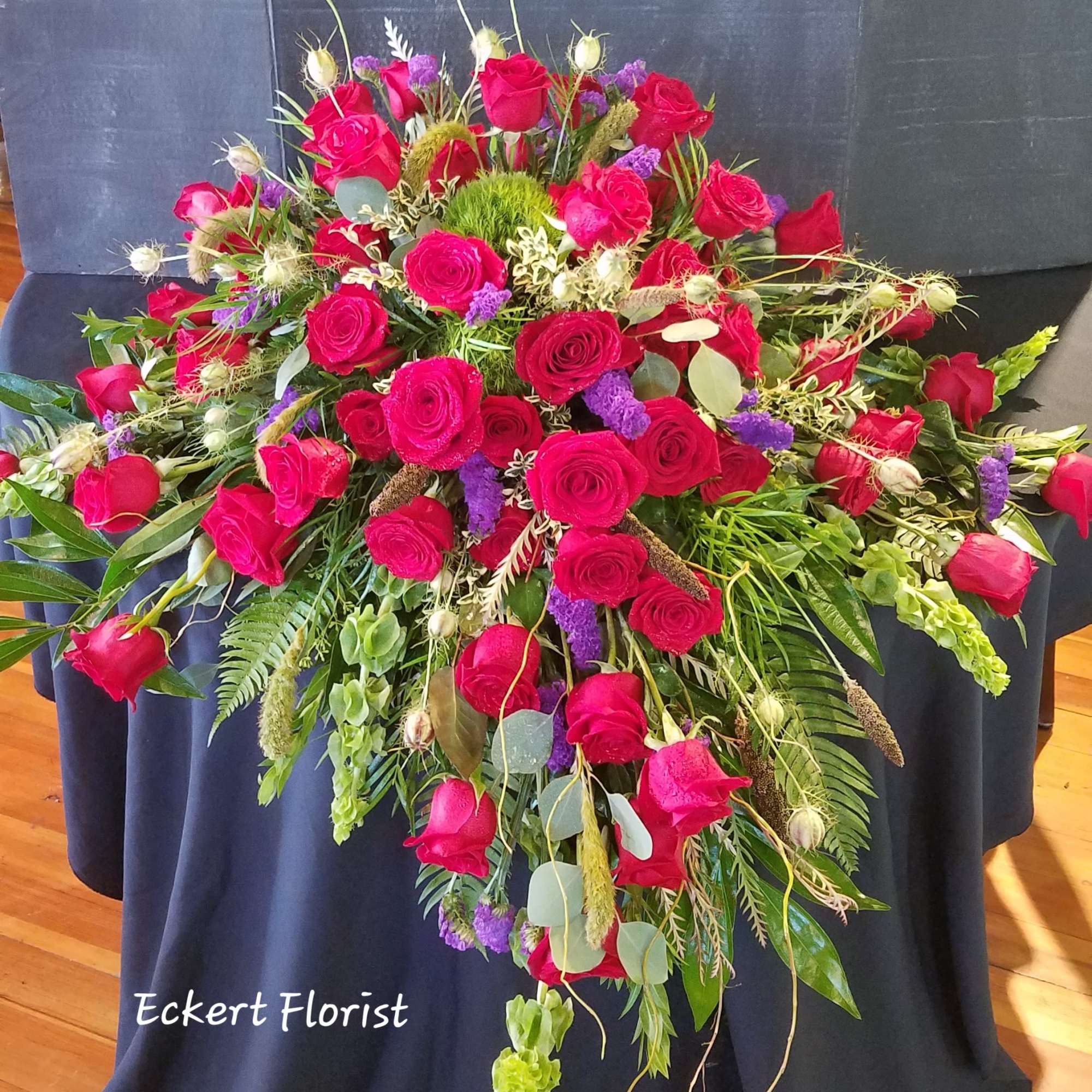 Eckert Florist's Enhanced Rose Casket Spray in Belleville, IL