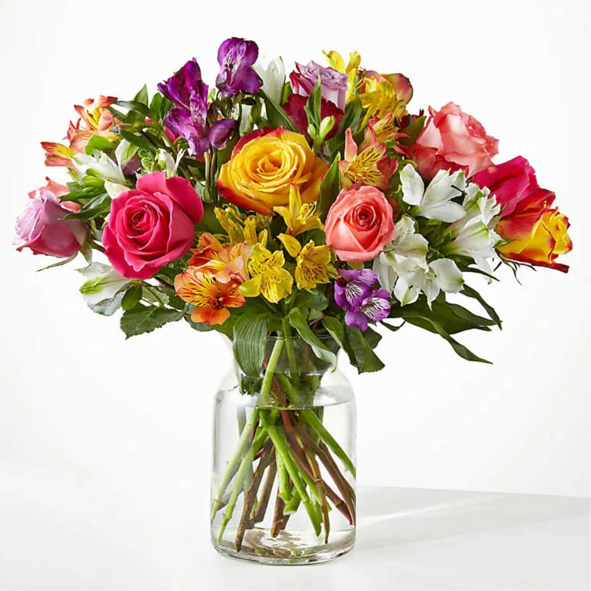 Bring a rainbow of color to any home with this bouquet. Blooming
