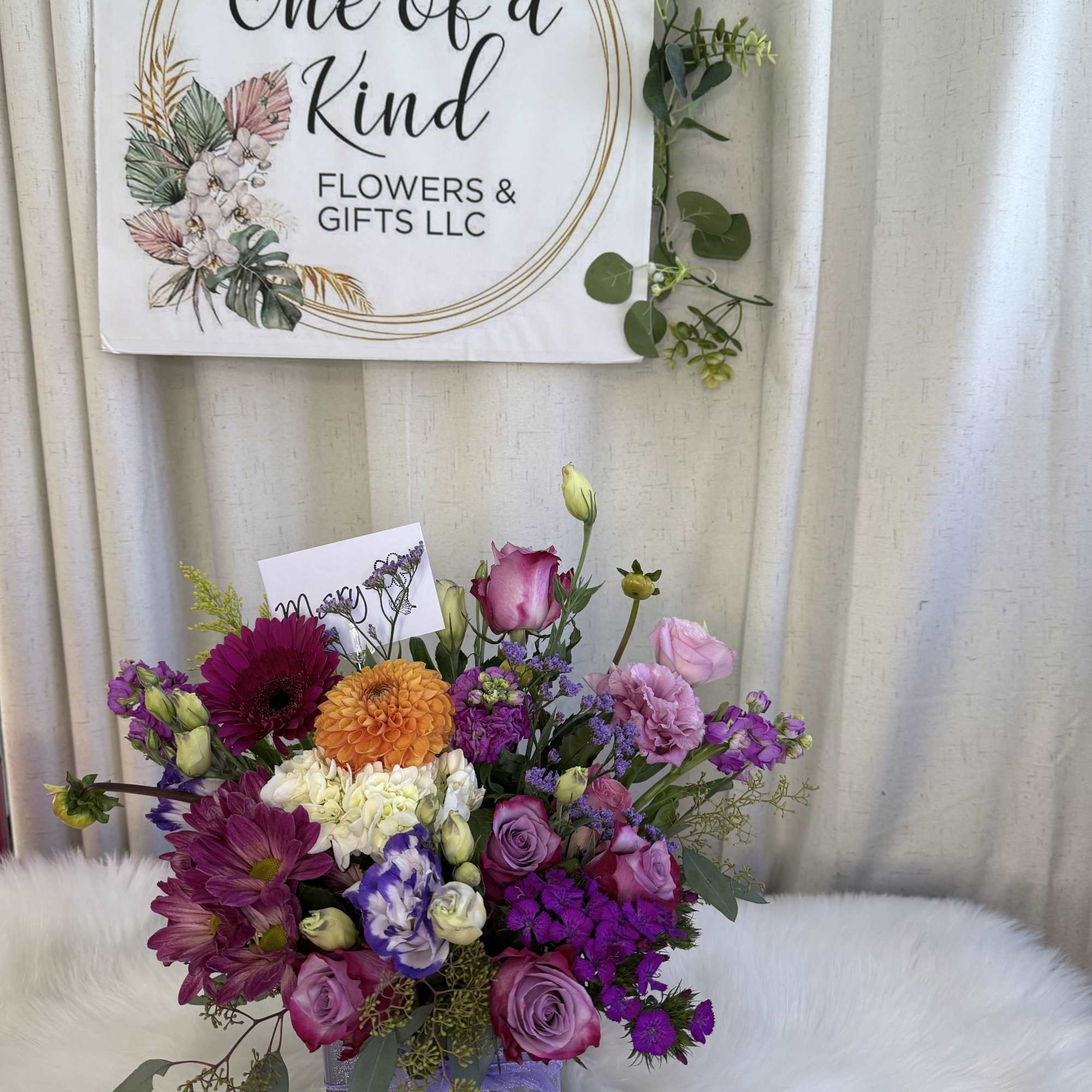 Color Charm, Floral Arrangement
A vibrant composition blending the elegance of lavender roses