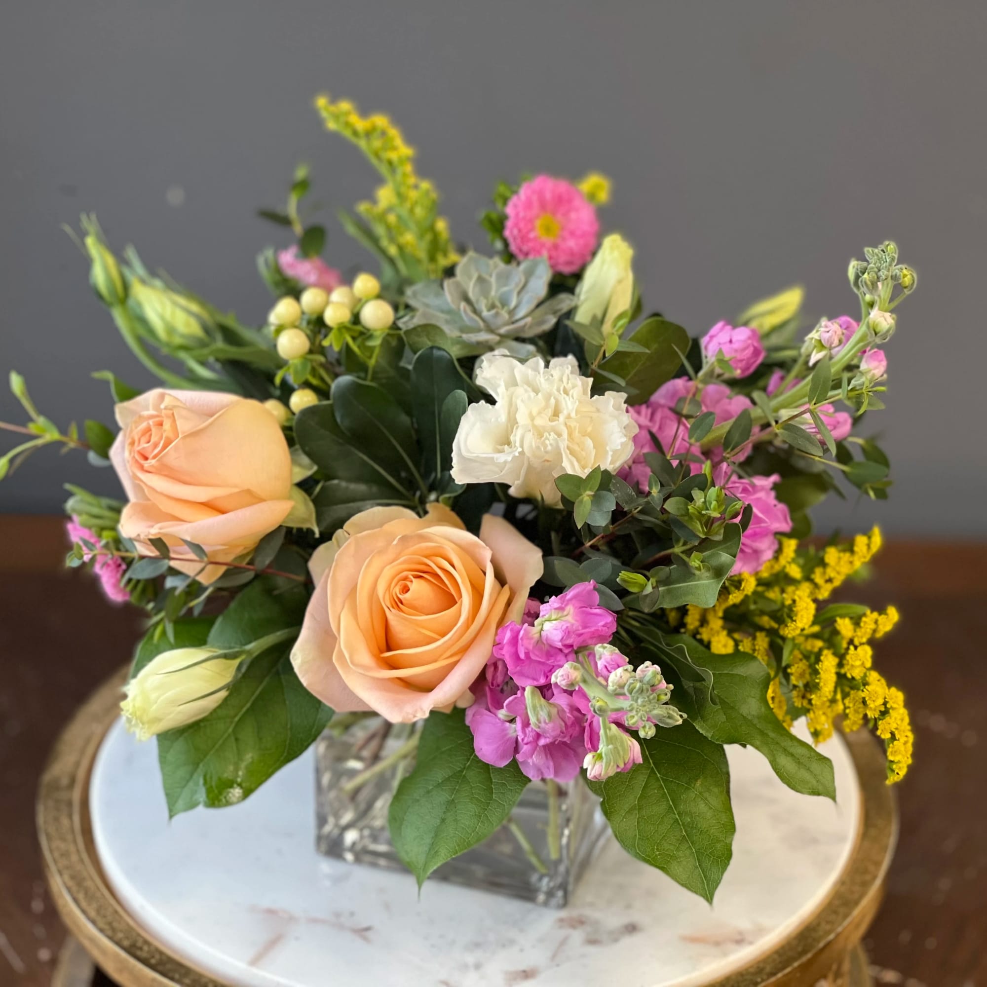 Jump fully into springtime with this whimsical arrangement! Fresh textures and fun