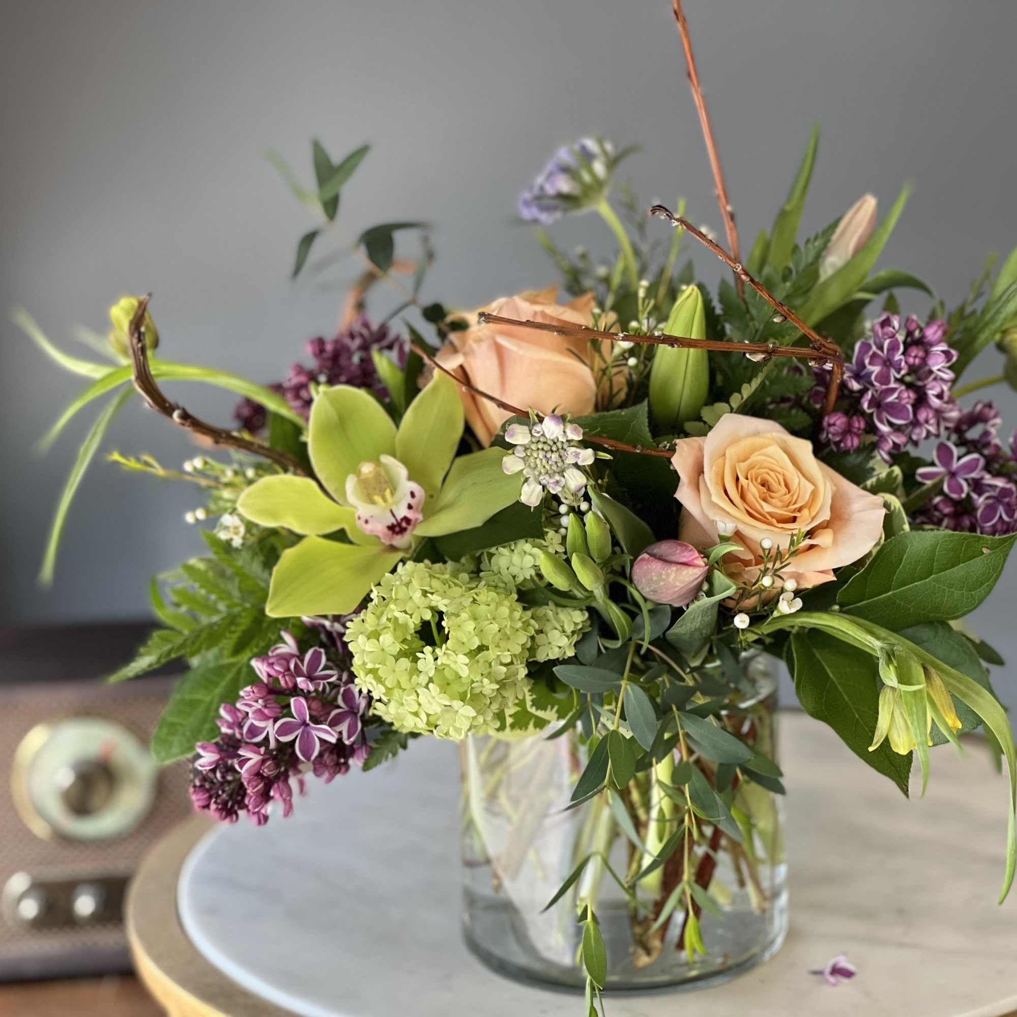 Jump fully into springtime with this whimsical arrangement! Fresh textures and fun
