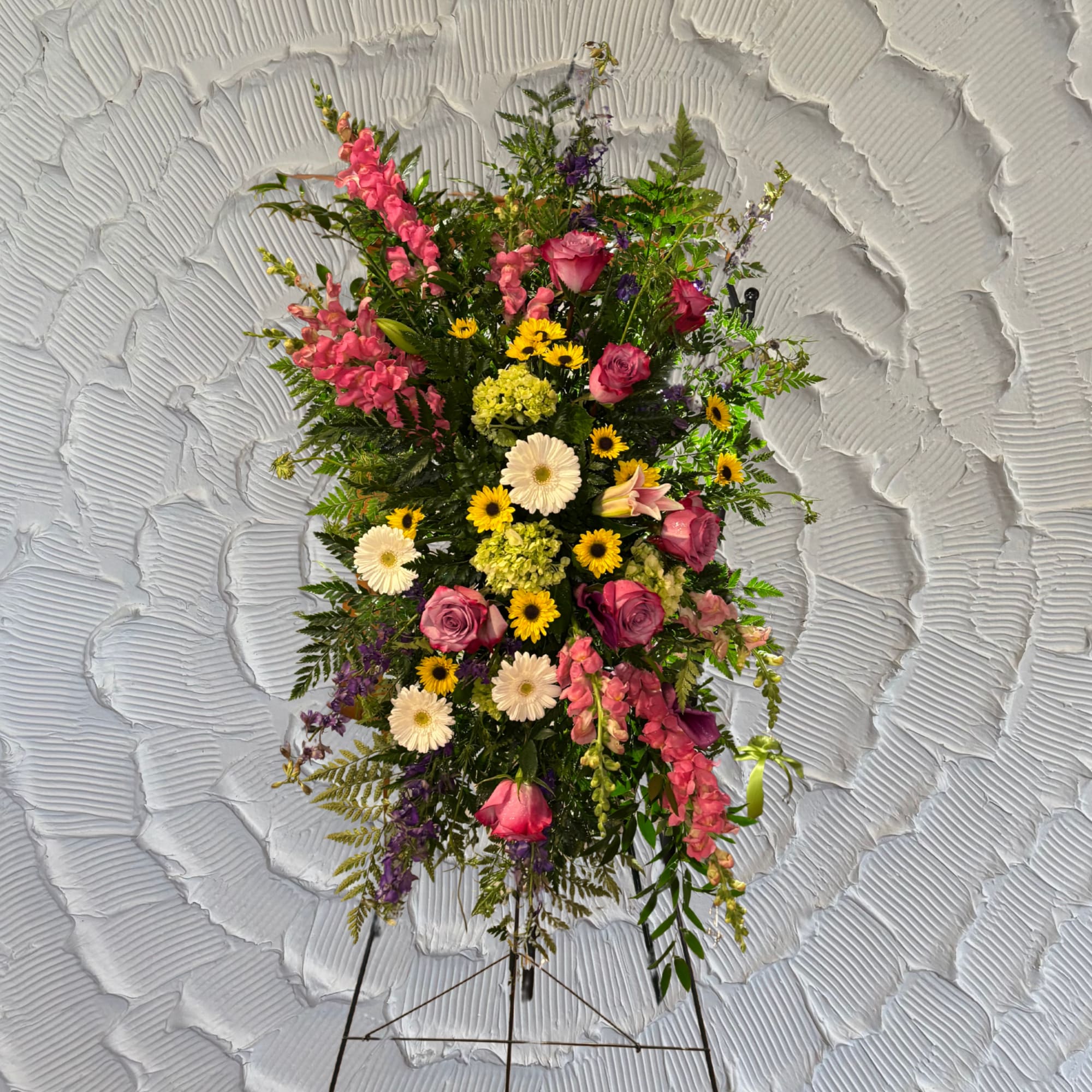 This Stunning Standing Spray is made with colors of Pinks, Yellows, Whites