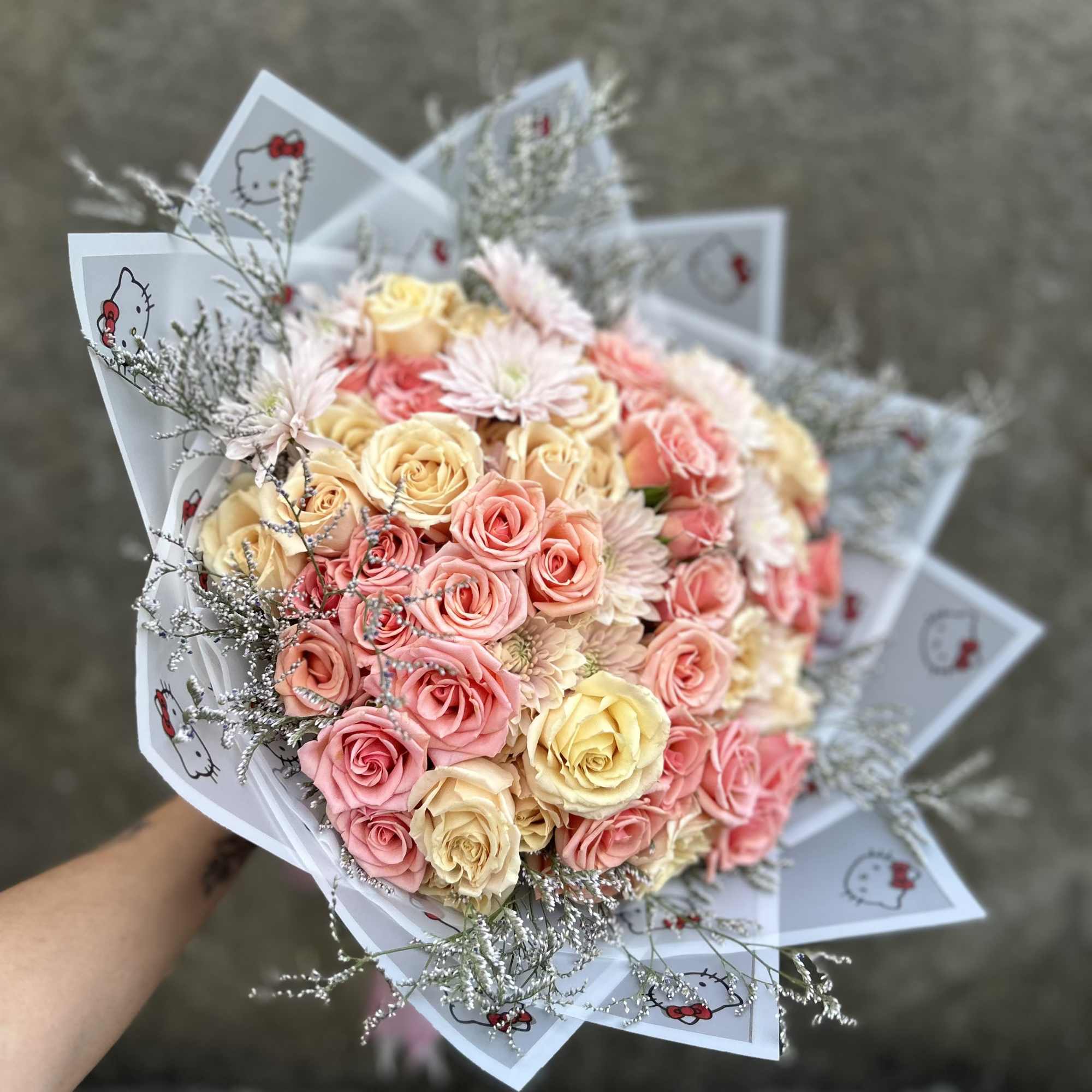 Spray rose bouquet in sweet peach colors, chrysanthemums, with blooming filler, pretty