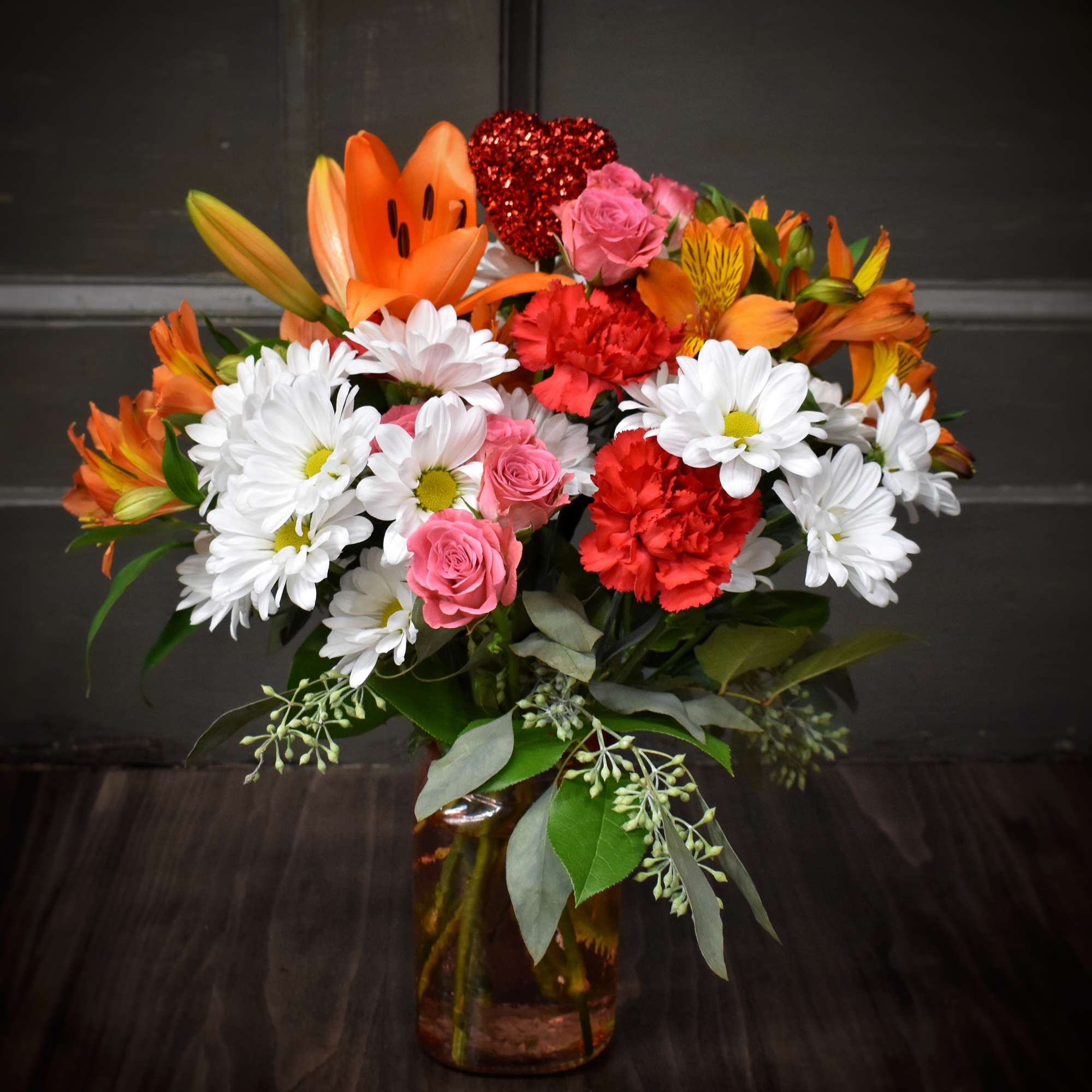 Our designers will create a bouquet of fresh cut flowers in Valentine