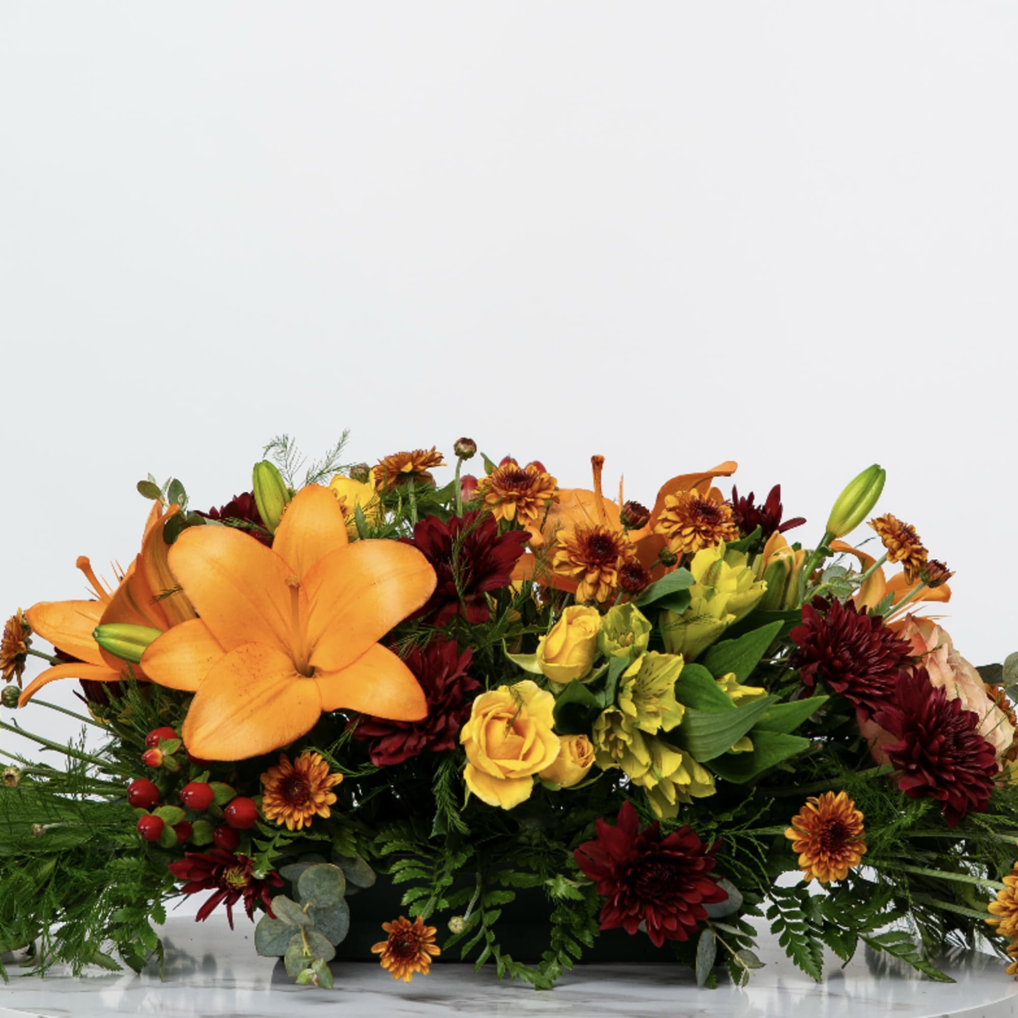 Introducing our Holiday Collection's Autumn Centerpiece! Let us deliver this gorgeous centerpiece