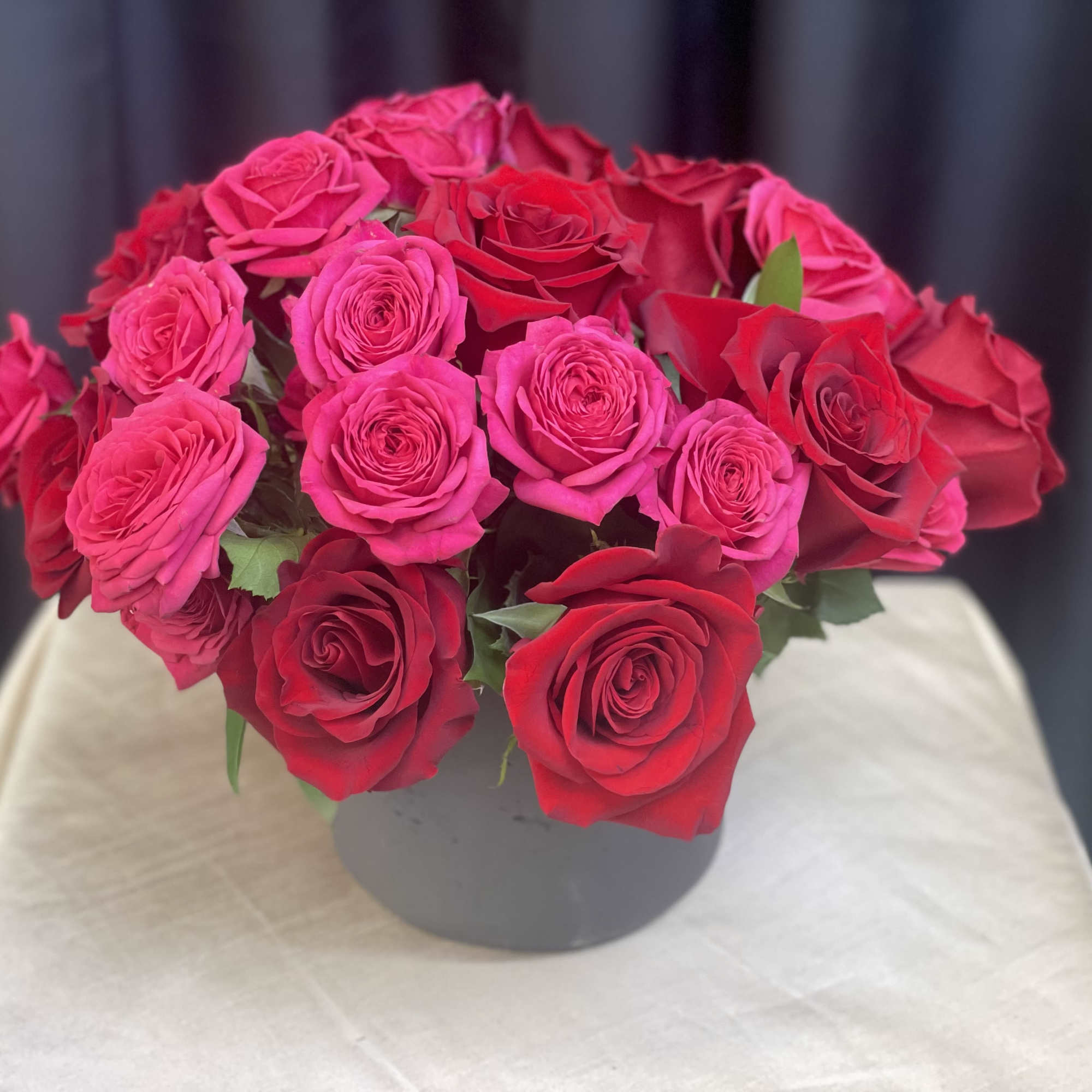 Velvet Current is a bold expression of modern romance. Lush all-red roses