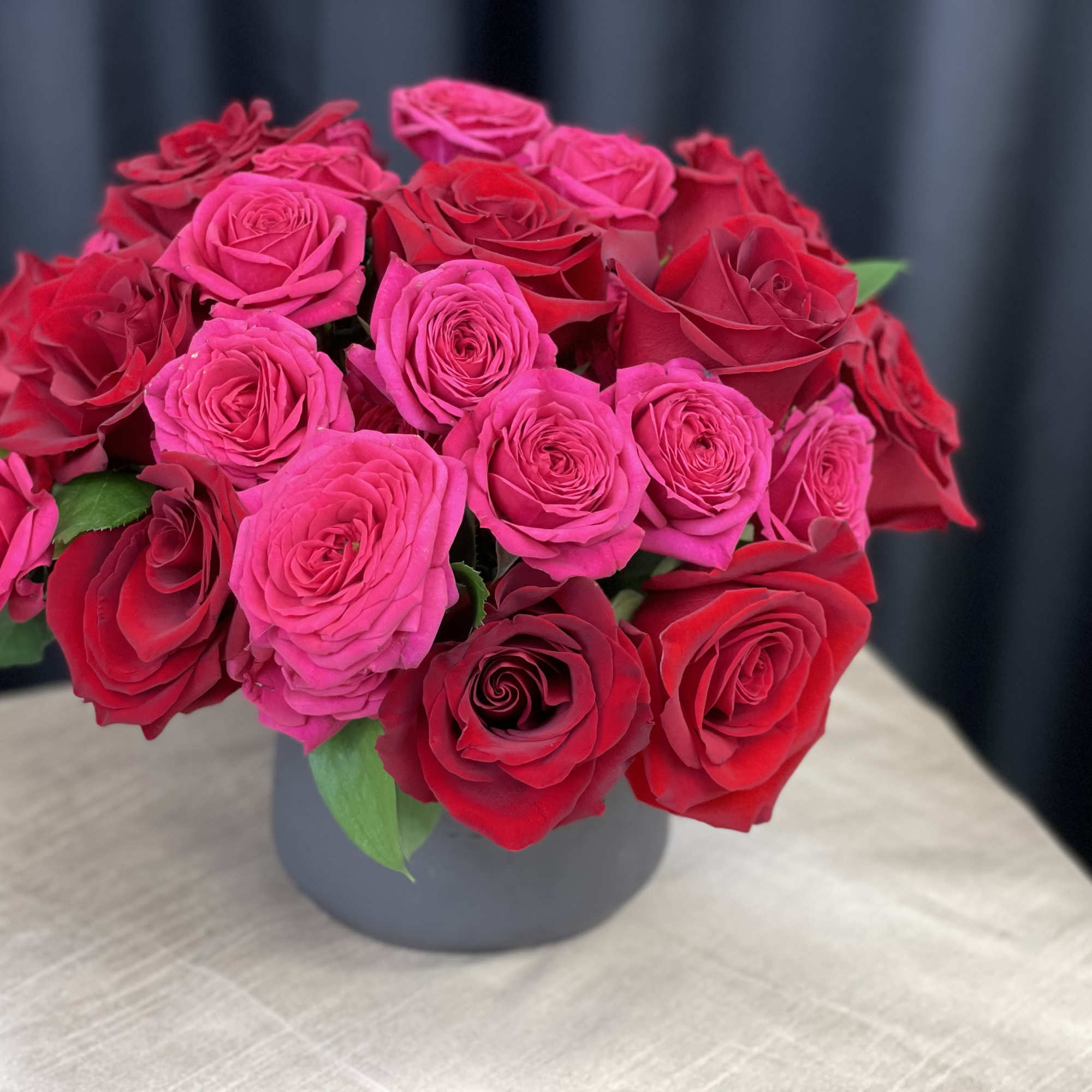 Velvet Current is a bold expression of modern romance. Lush all-red roses