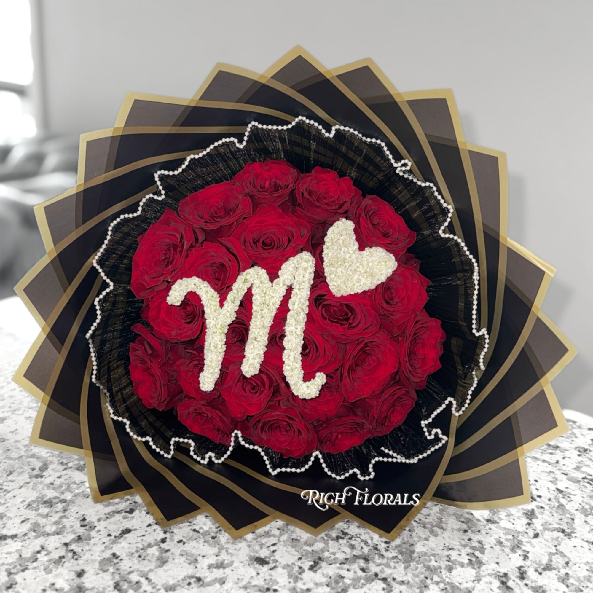 Make it personal with The Initial Heart Bouquet&mdash;a stunning arrangement of roses