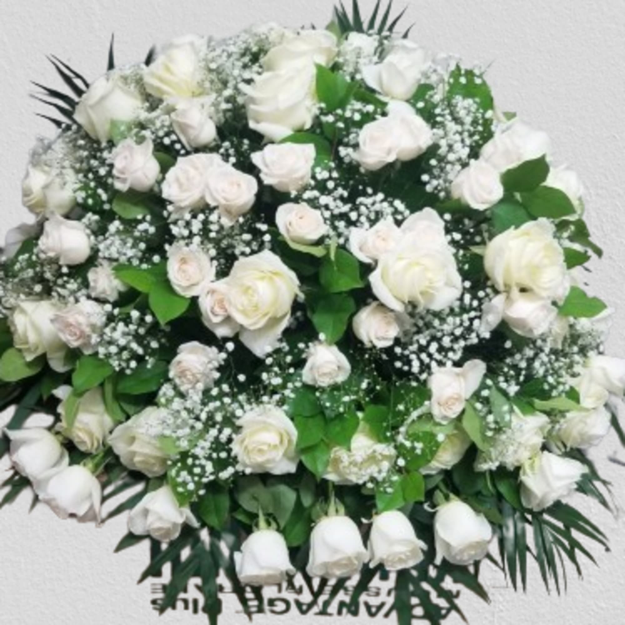 Sympathy Casket Spray with Roses, Babies breath and greenary