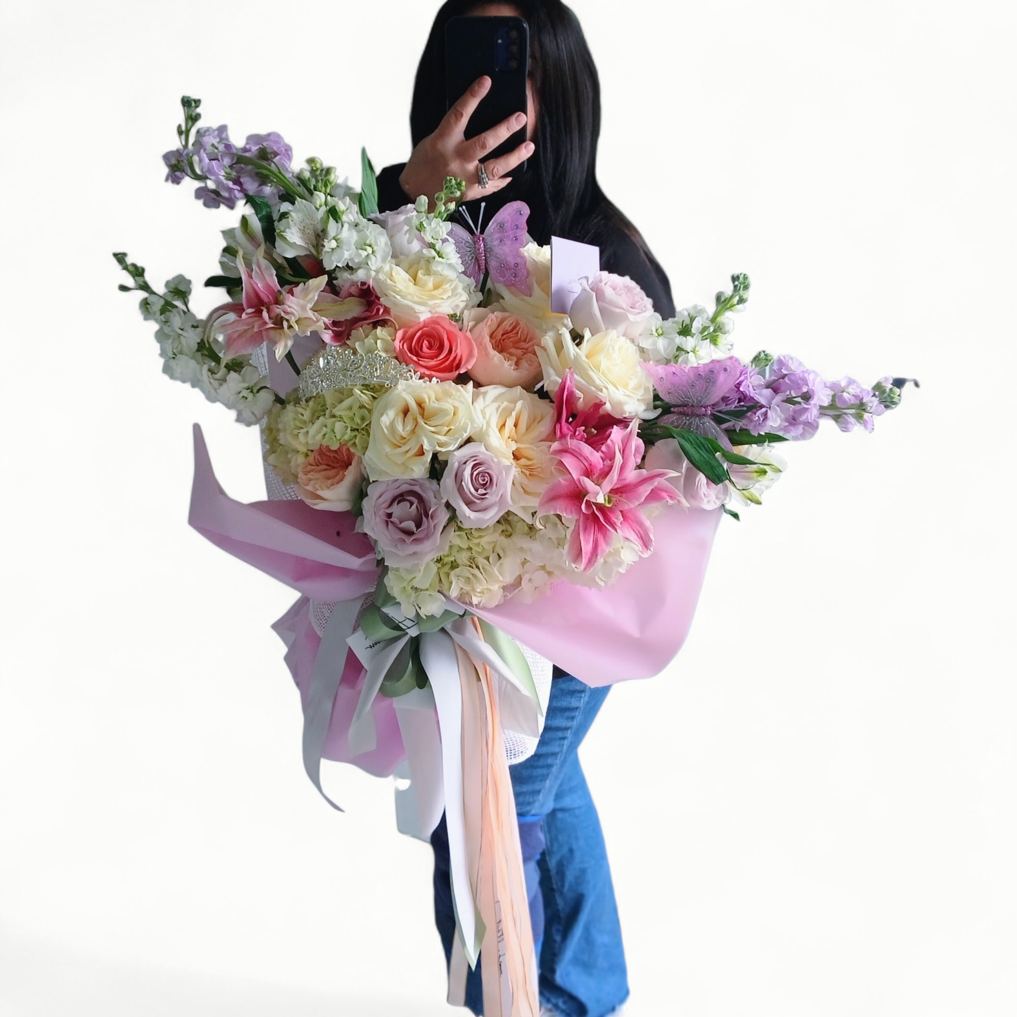 Send this beautiful all pink and lavender blossoms bouquet filled with roses