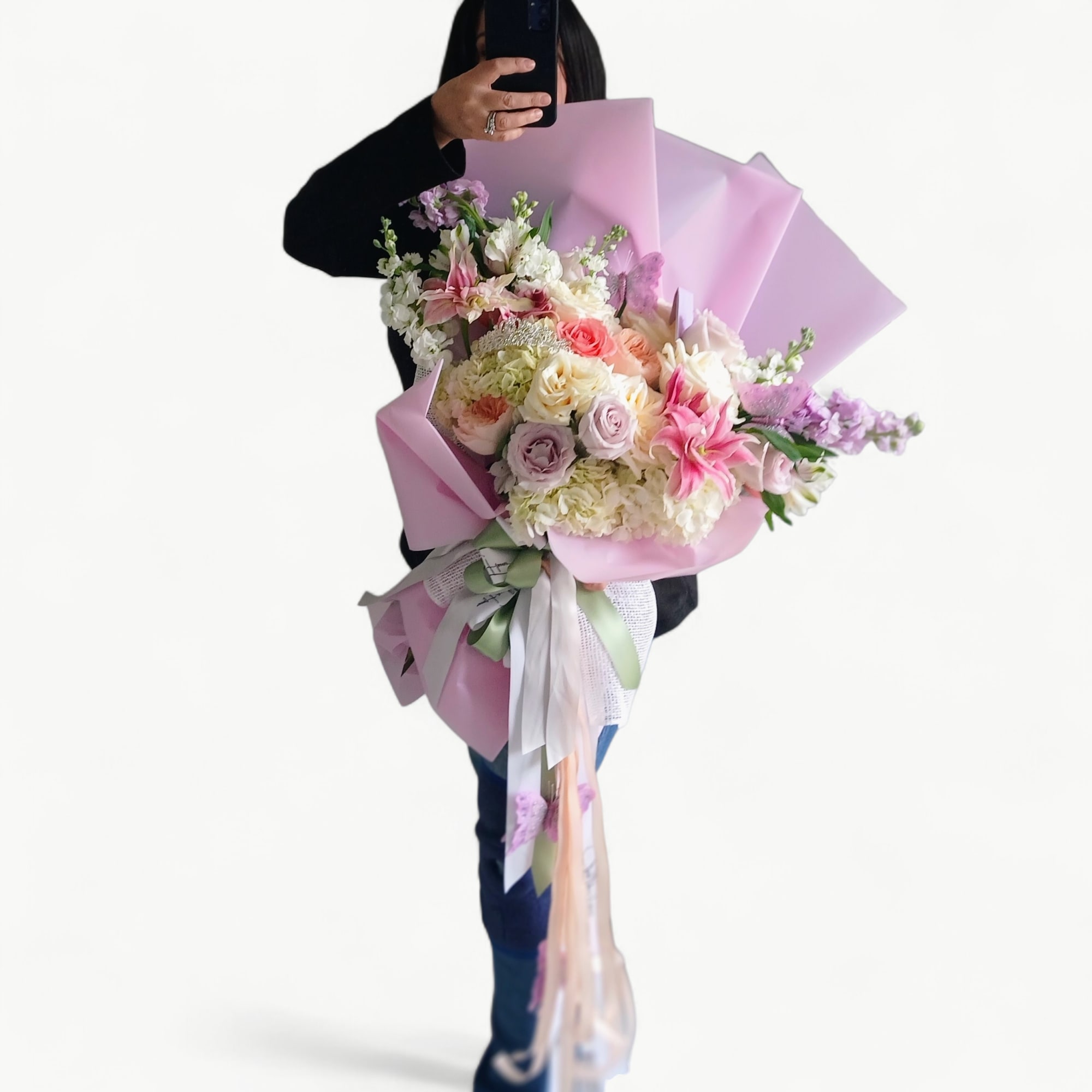 Send this beautiful all pink and lavender blossoms bouquet filled with roses