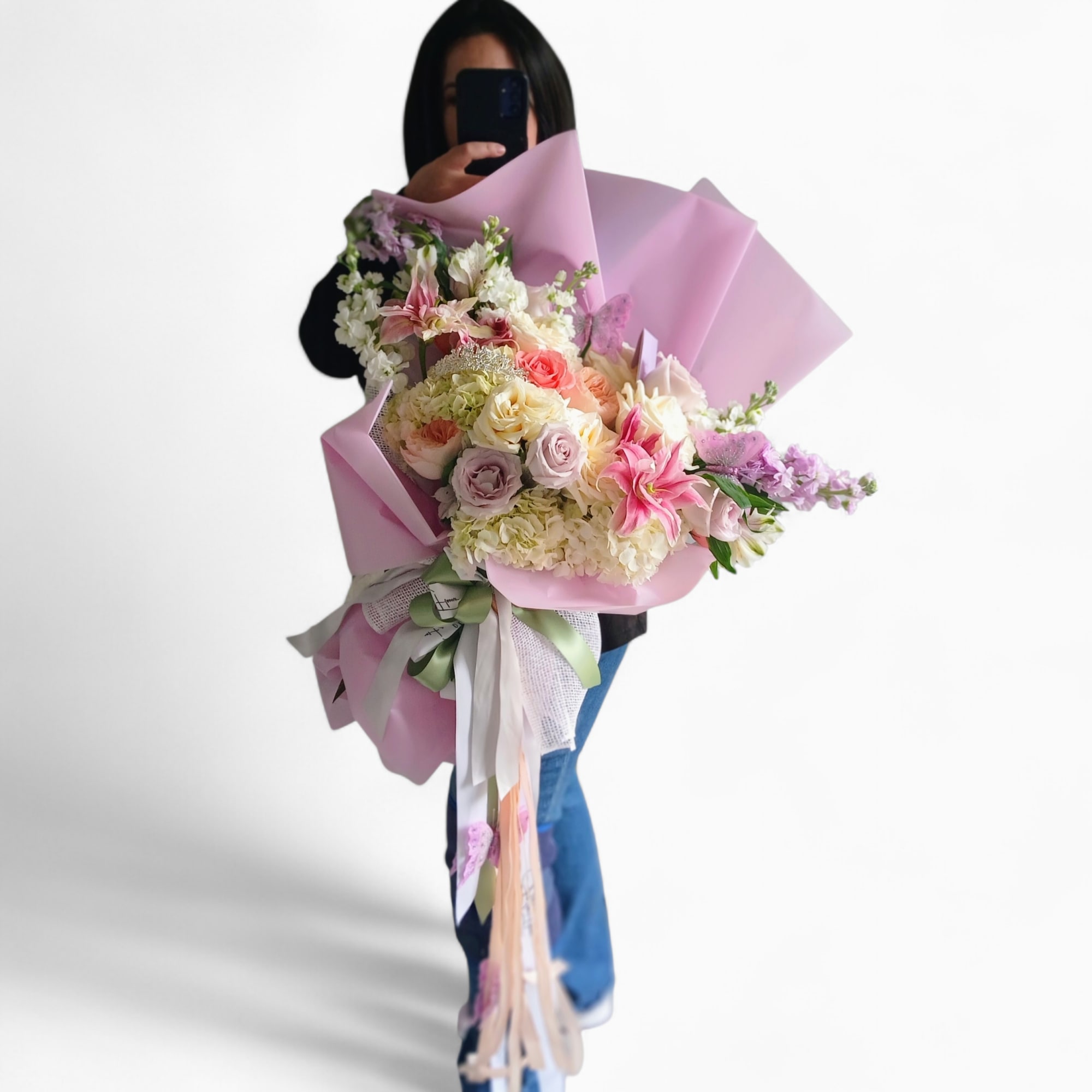 Send this beautiful all pink and lavender blossoms bouquet filled with roses