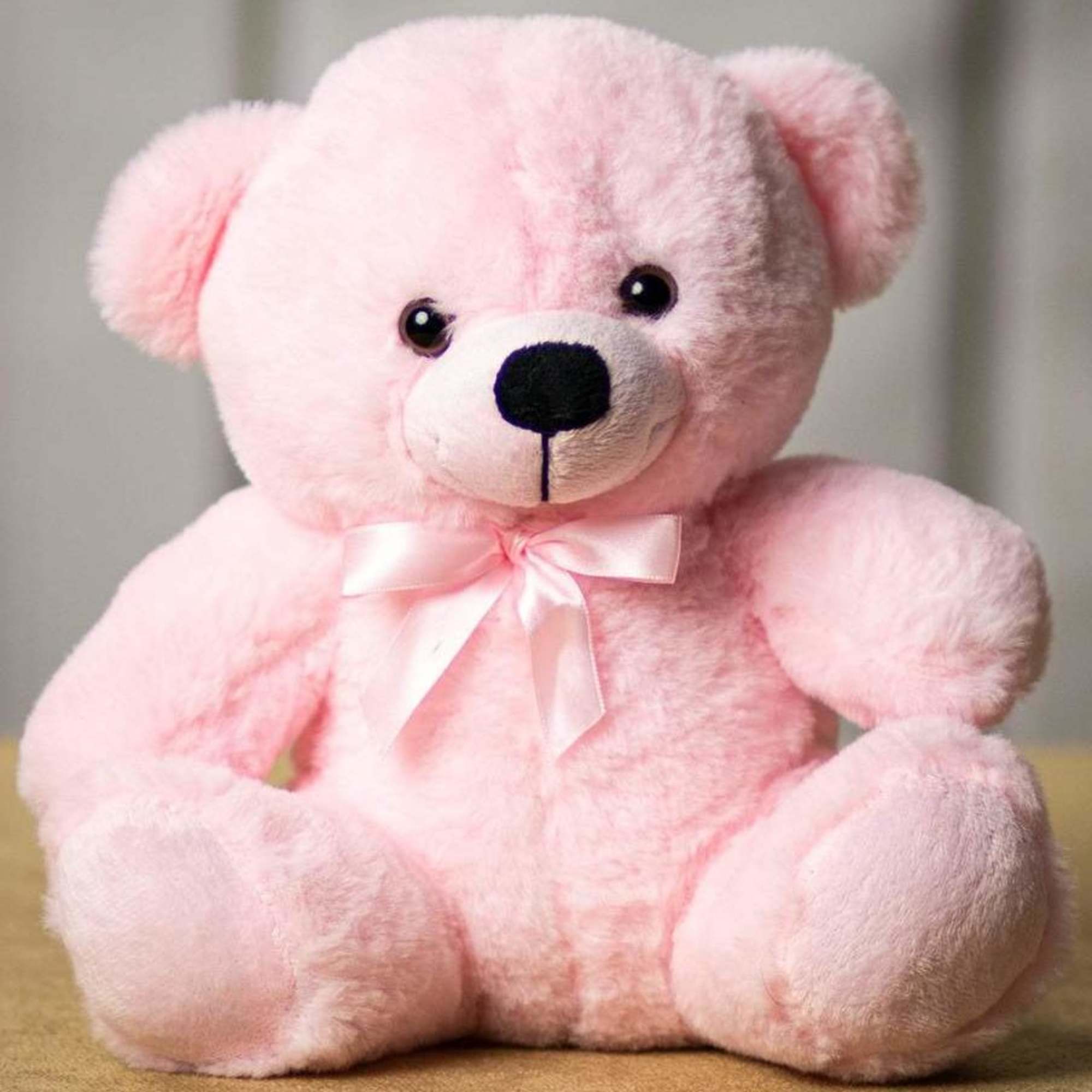 Soft and cuddly pink teddy! Measure 6 inches while sitting, from head