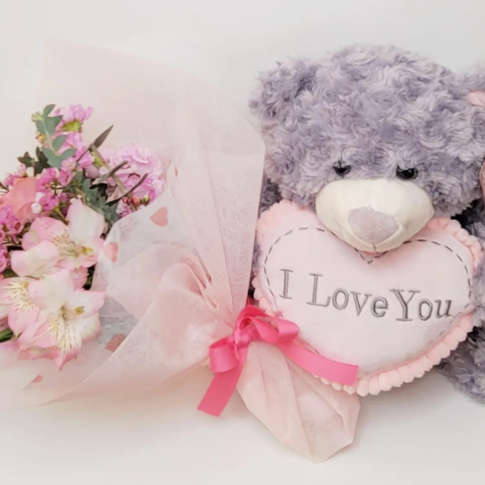 Adorable all pink bouquet with roses, stock flower, wax or babies breath