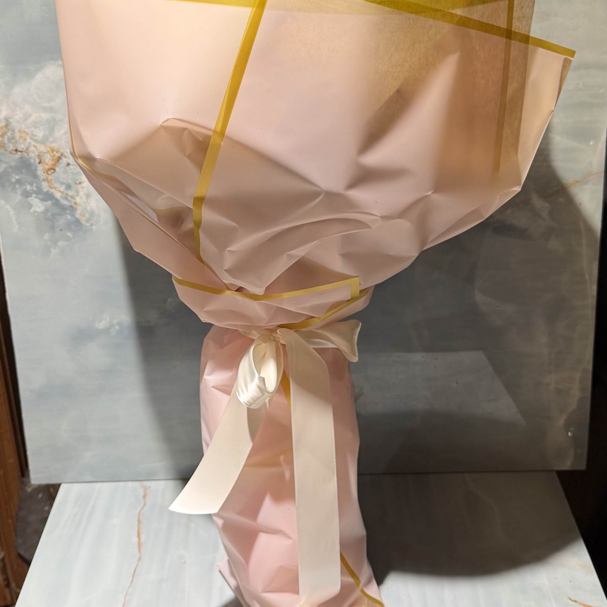 This bouquet feels soft, elegant, and beautifully balanced-full of gentle color and