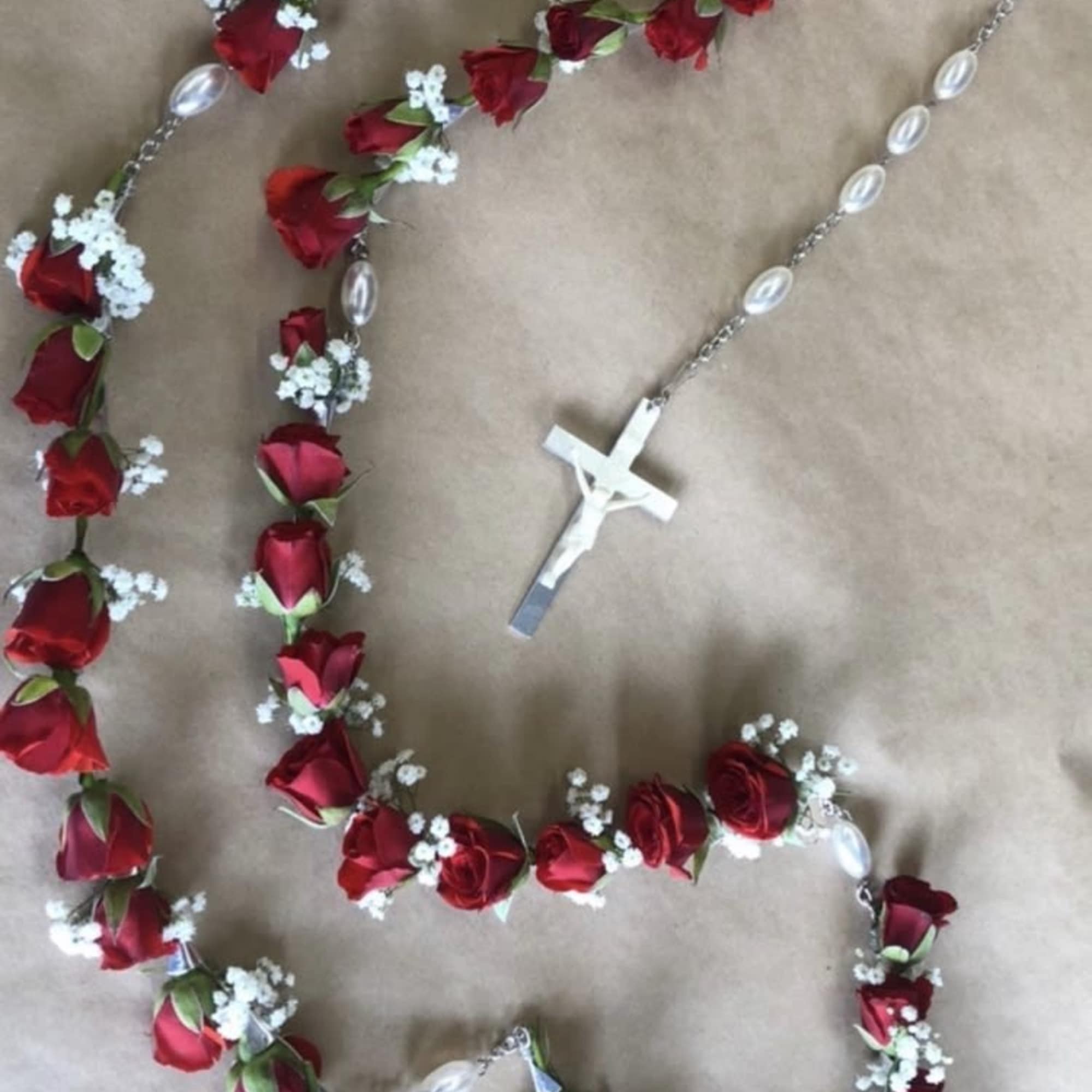 54&rdquo; rosary made with 50 spray red roses 