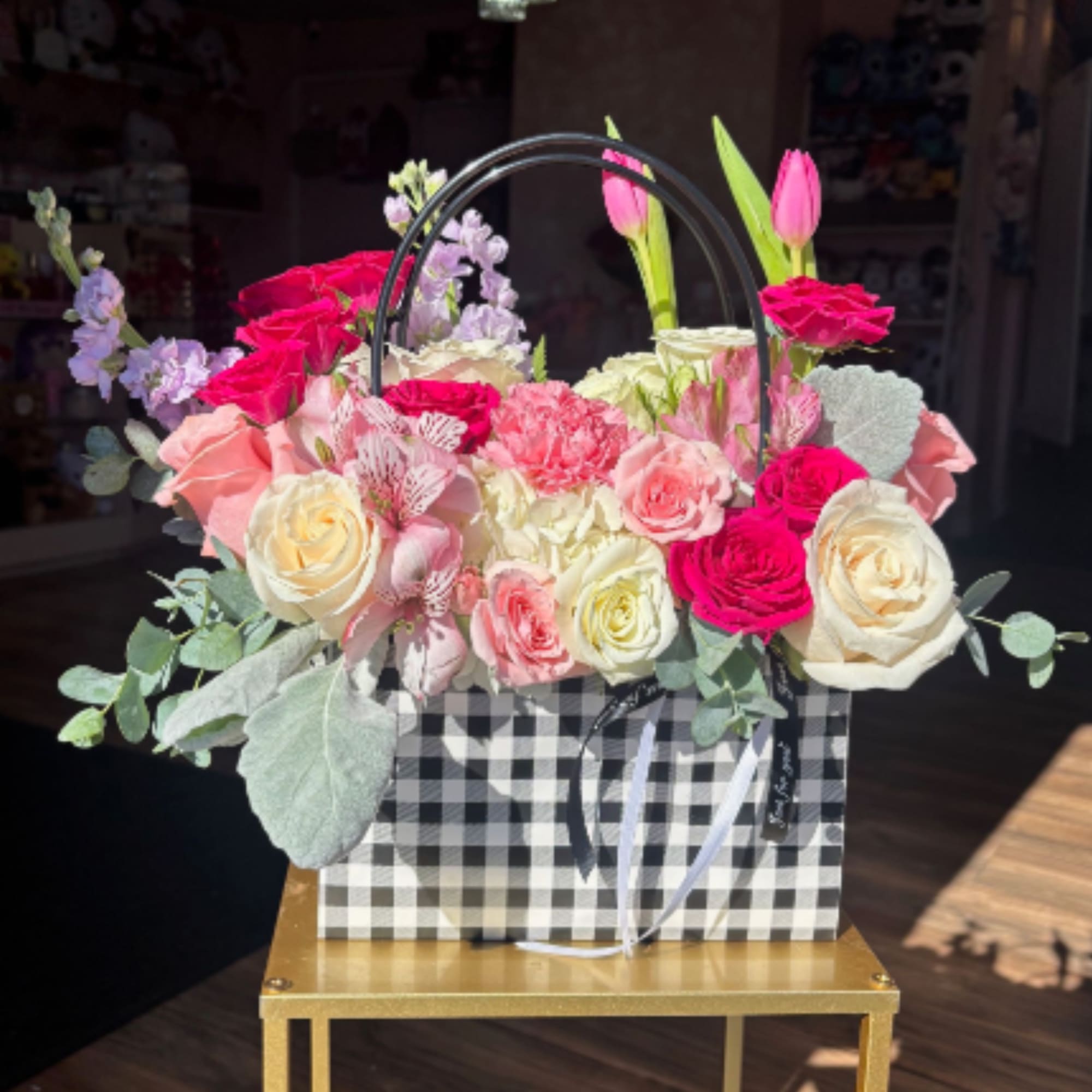 Super Fun Tote of flowers, modern style arrangement with all the elements
