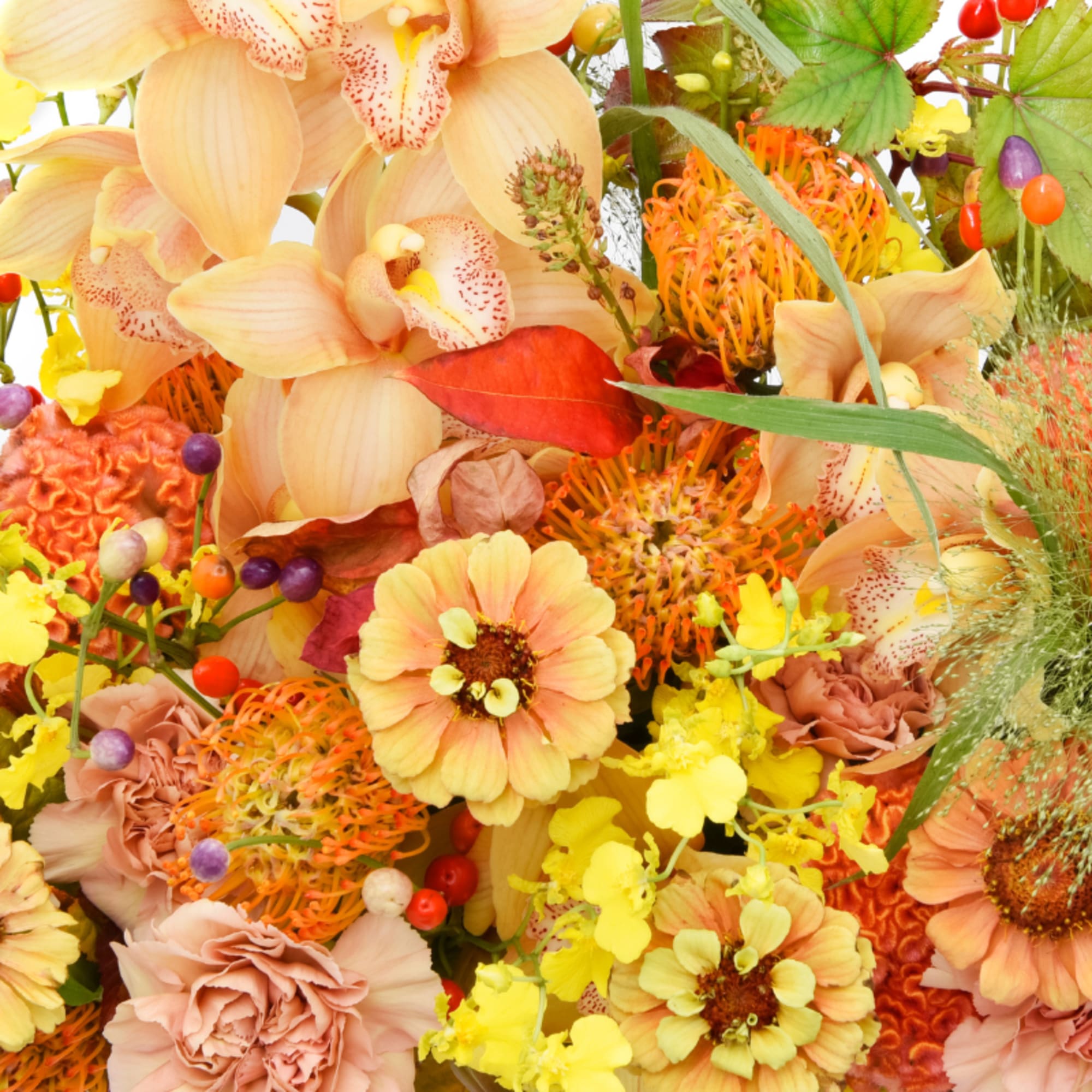 A warm, golden floral palette with yellow, honey, tangerine, and coral tones.