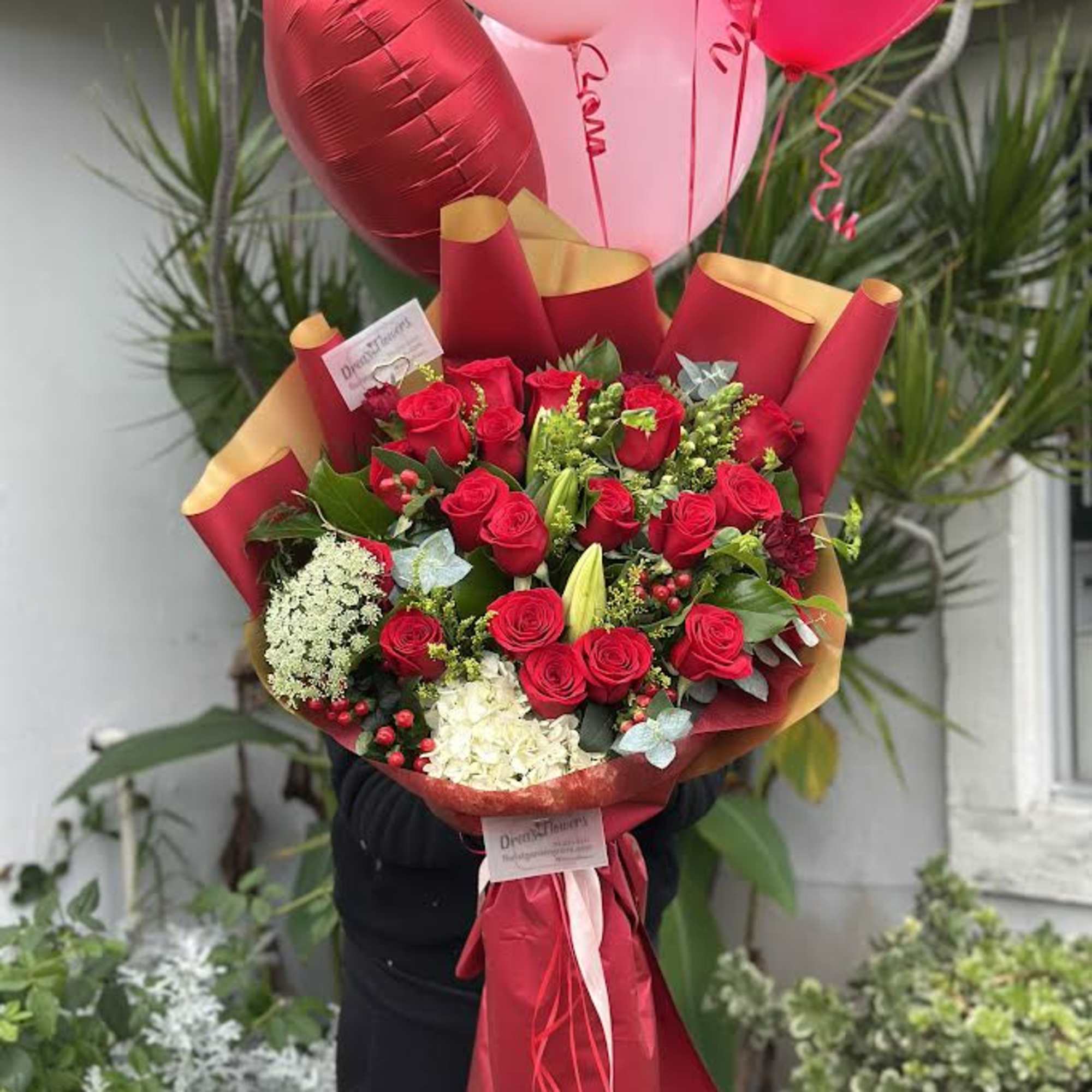 Our just for you red rose bouquet mix. Handheld bouquet , you