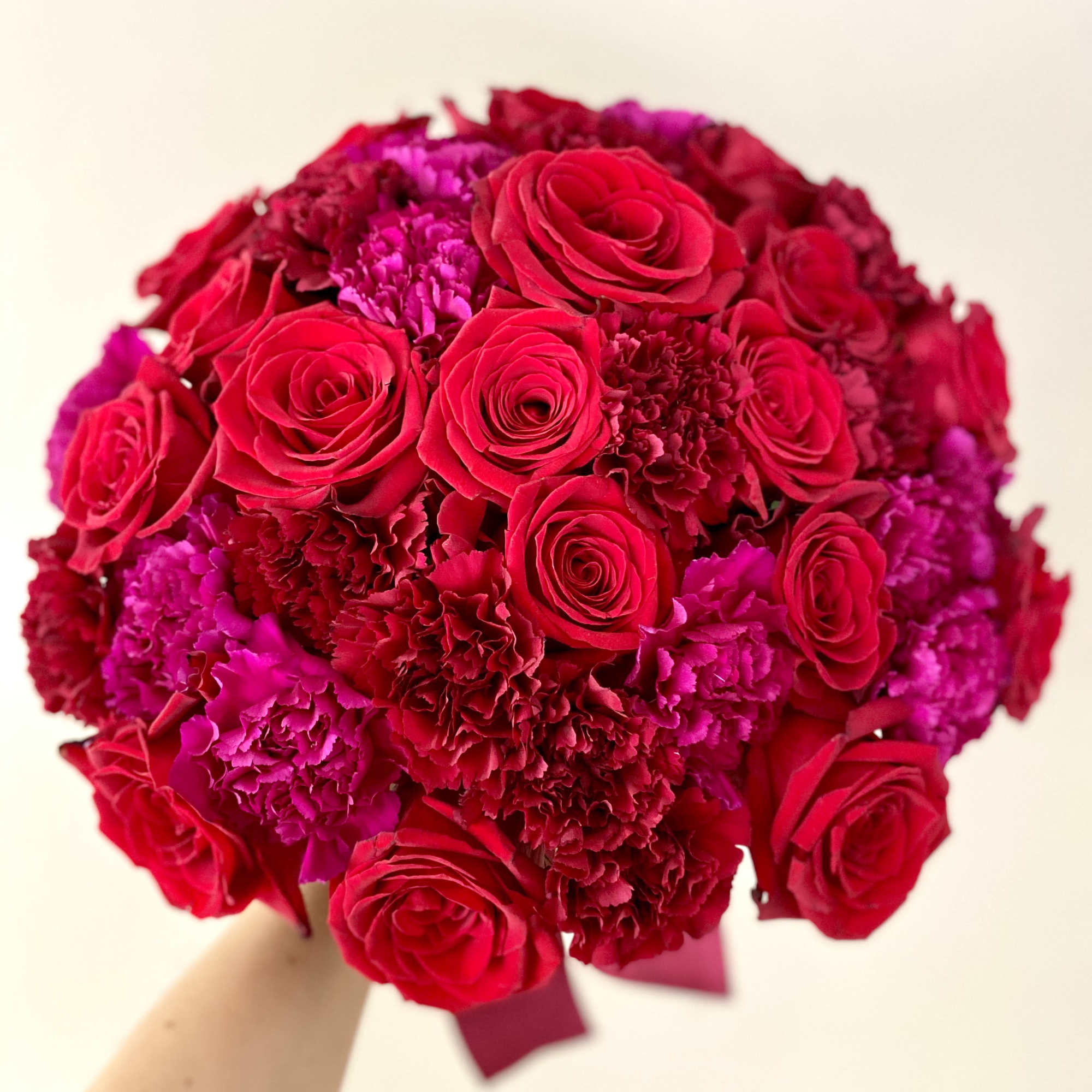 Lush, elegant, and unique bouquet will definitely make Her smile! 
The red
