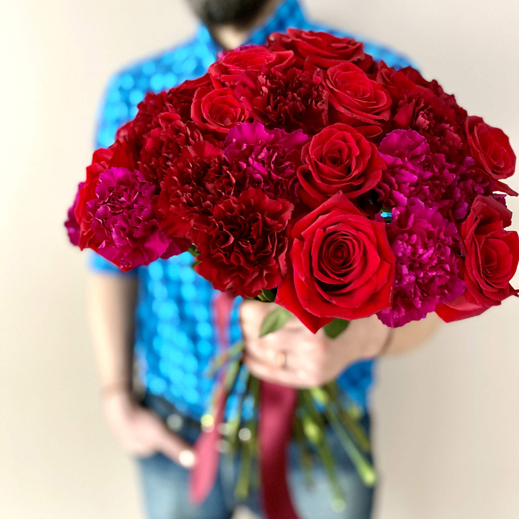 Lush, elegant, and unique bouquet will definitely make Her smile! 
The red