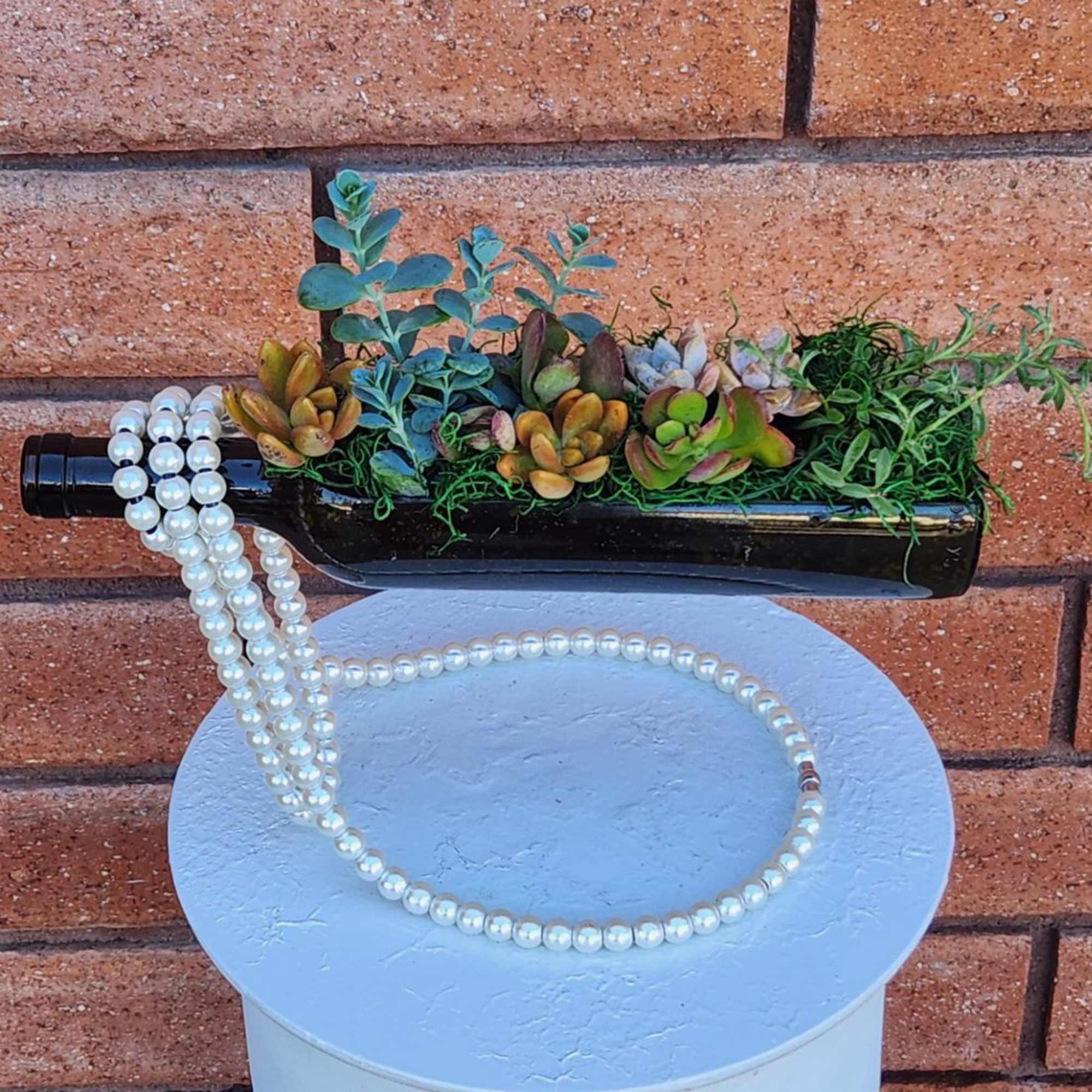 Wine Bottle Succulent Garden &ndash; Handcrafted Living Decor

Add a touch of life