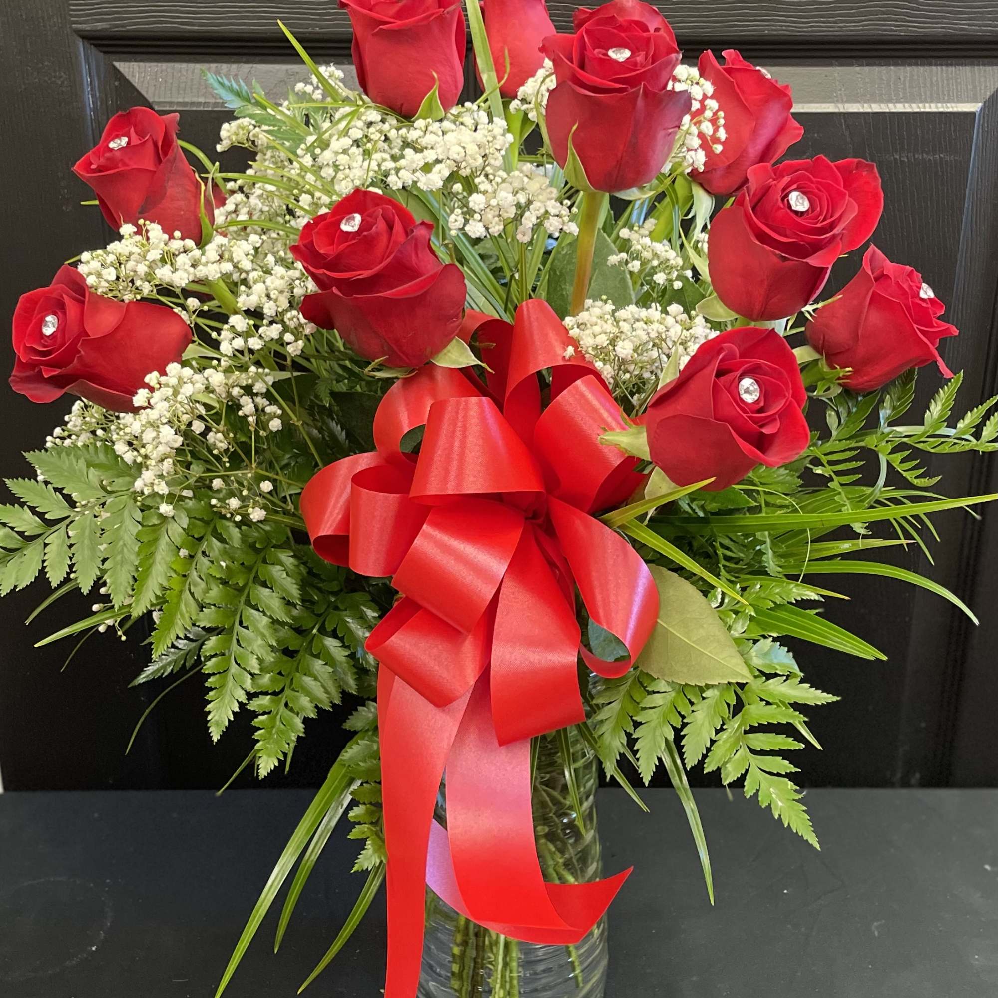 Our premium long stem red roses are an elegant surprise for the