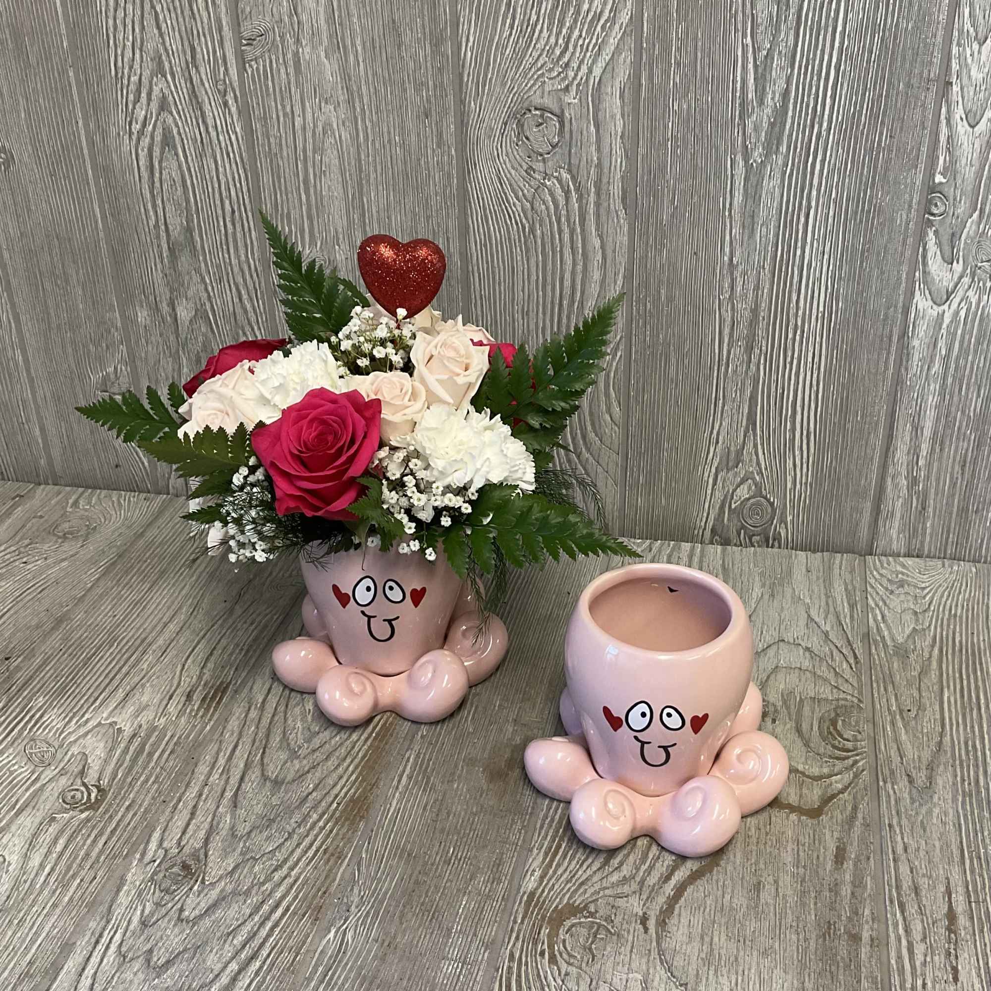A cute Valentine&rsquo;s arrangement in a keepsake ceramic octopus vase. Colors and