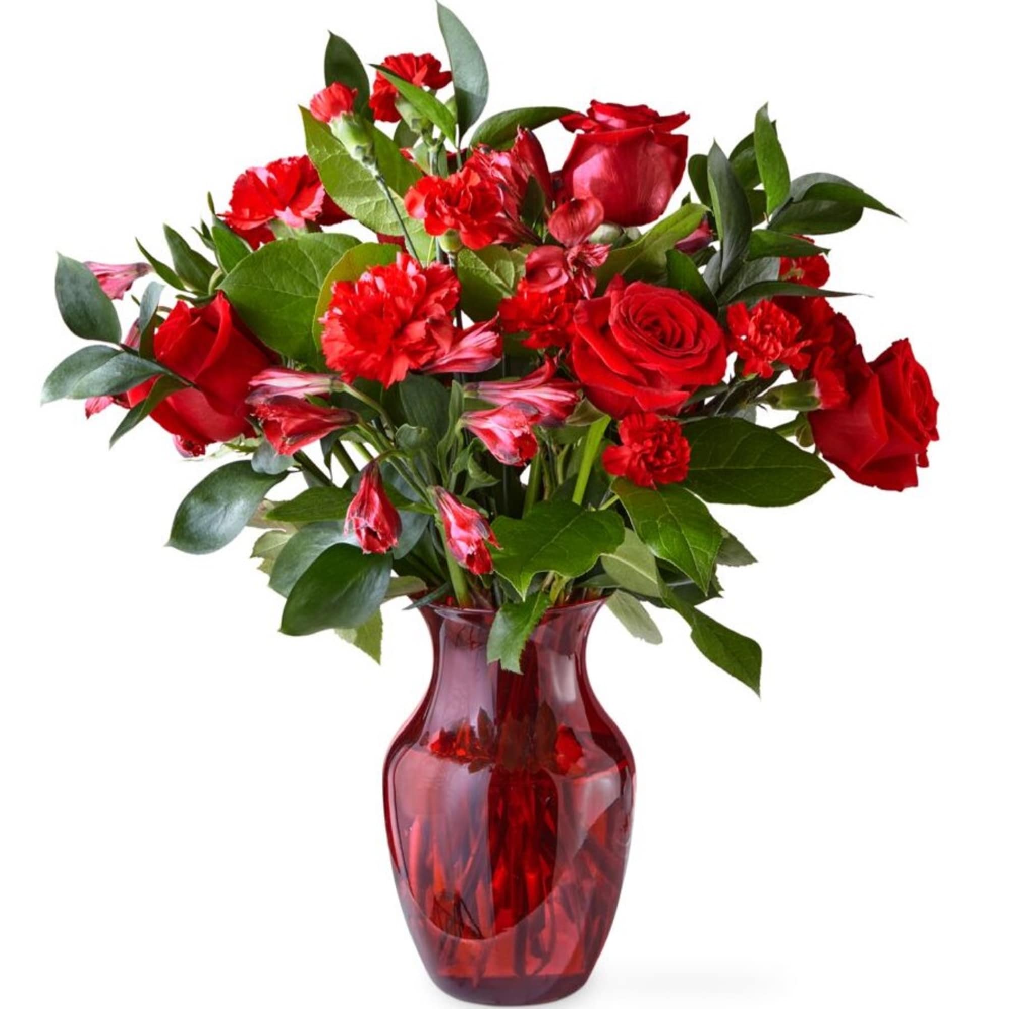 Amplified by a ruby red vase, this rich arrangement of roses and