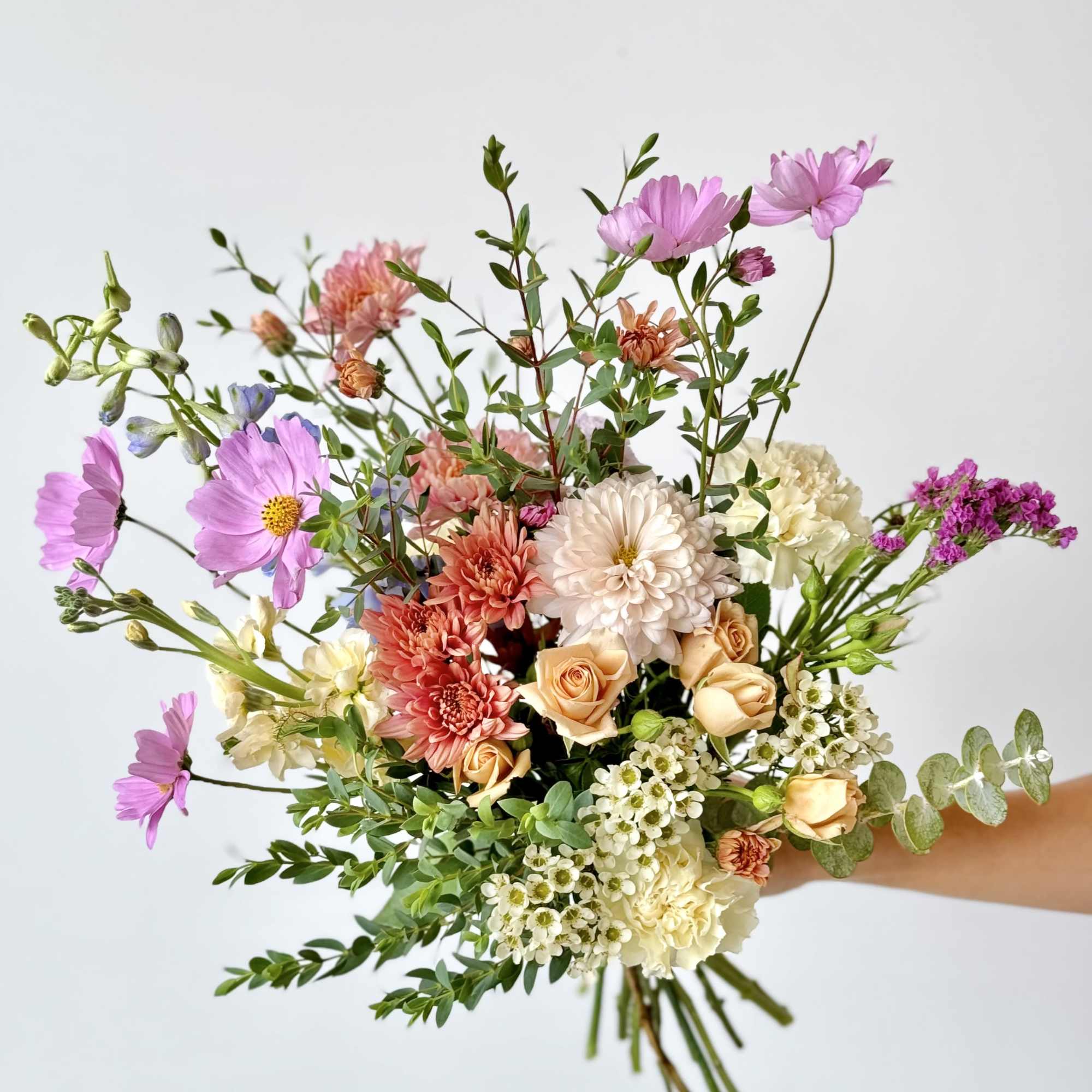 These petite bouquets are thoughtfully arranged with fresh, seasonal blooms chosen by