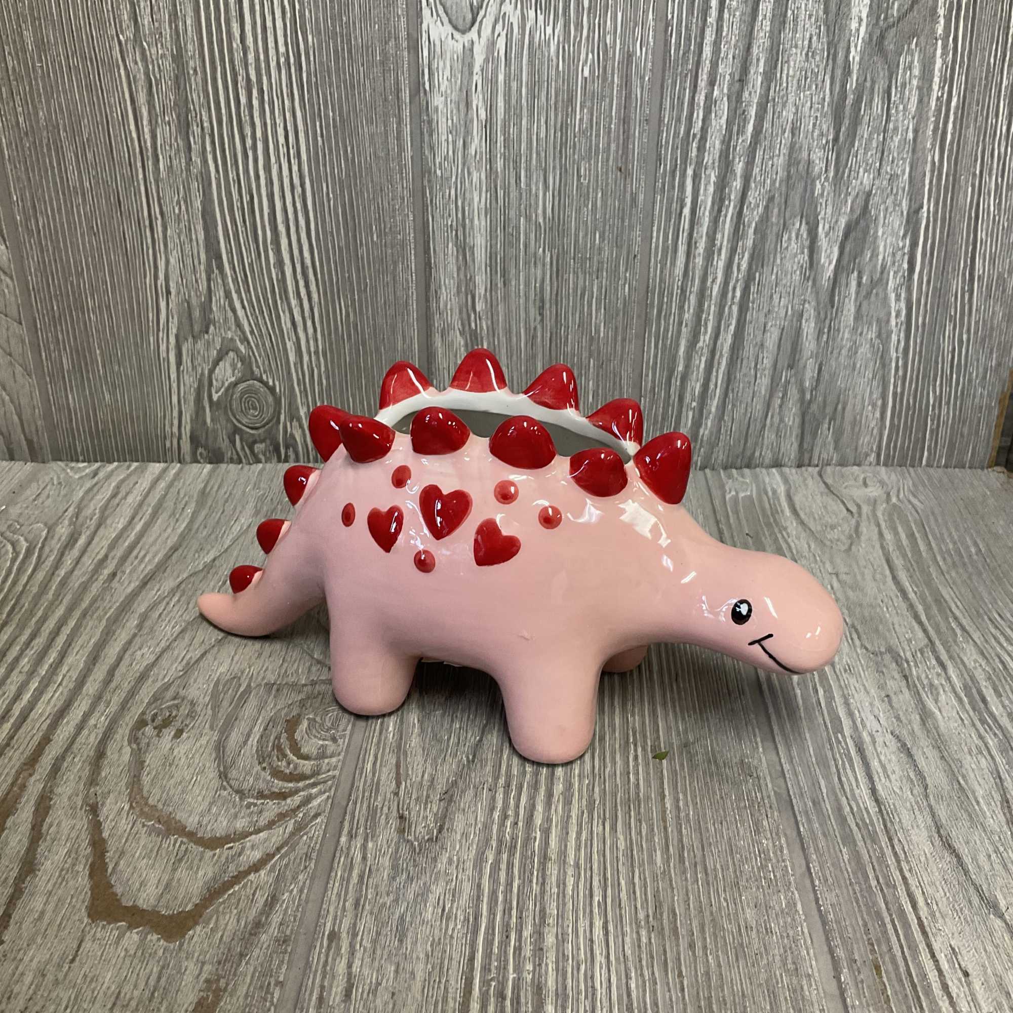 Surprise your Valentine with this sweet stegosaurus arrangement, coupled with a matching