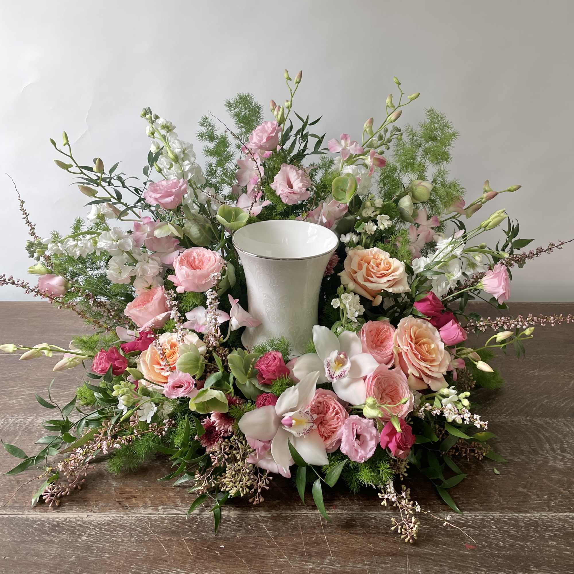 Honor a beautiful life with our Eternal Bloom Urn Surround, a gracefully