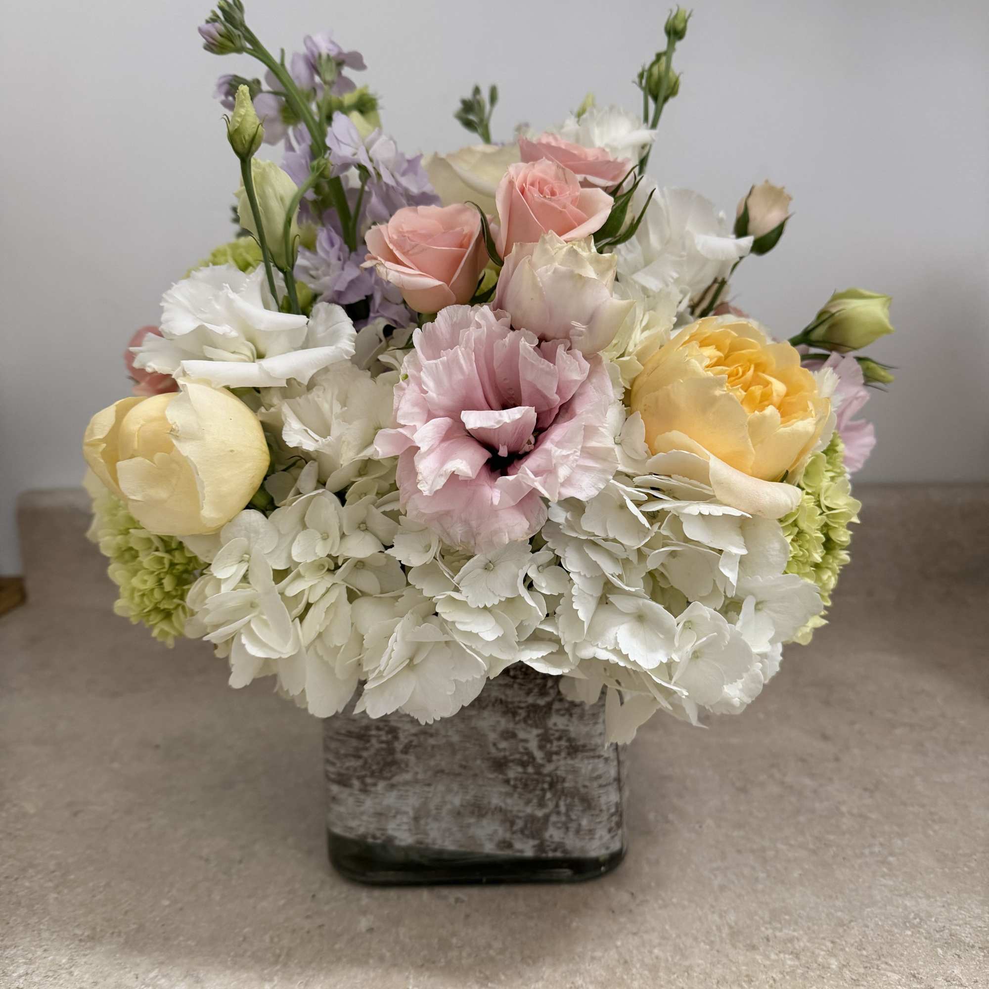 a work of art in flowers, with a combination of flowers such