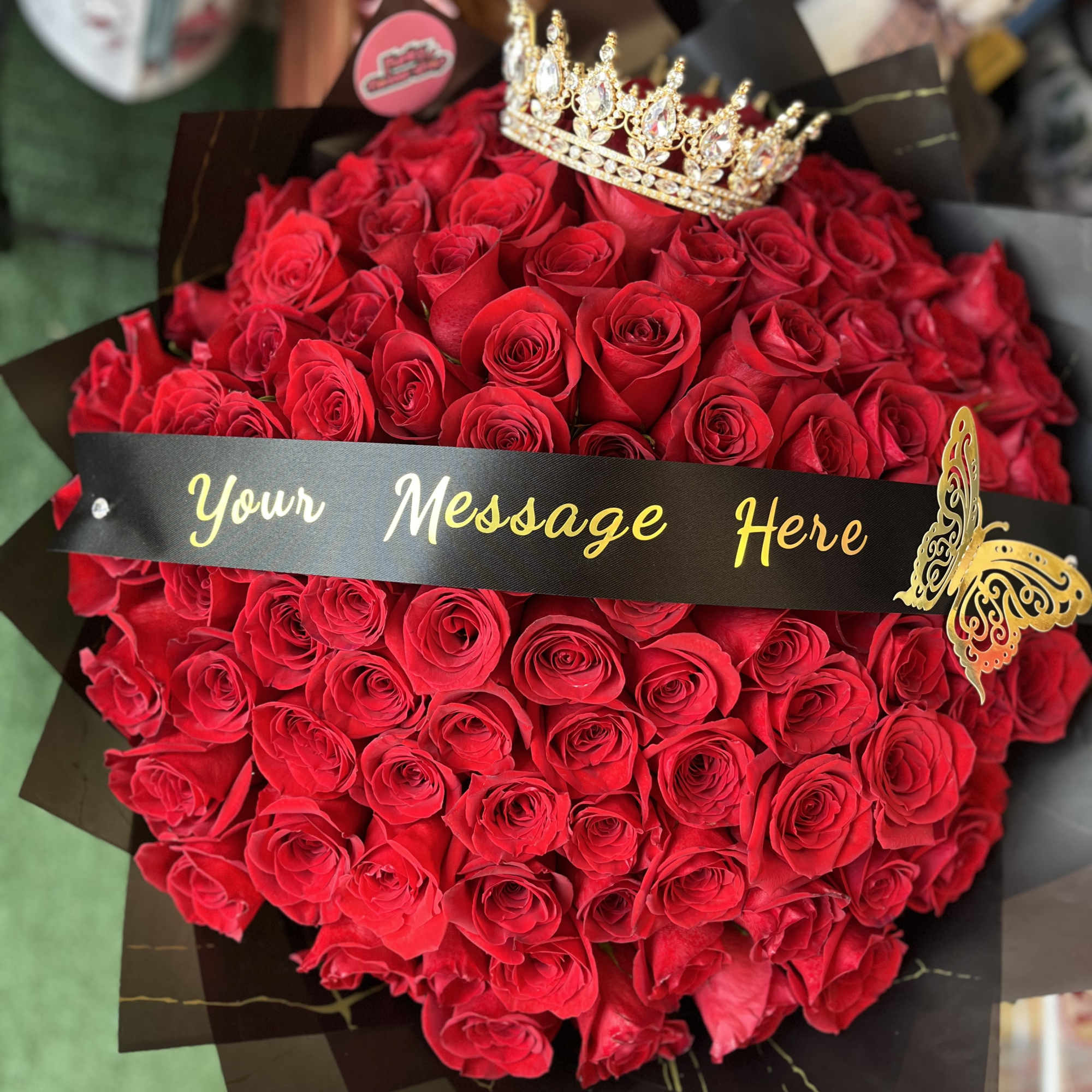 Averages 100 roses with a customizable sash and a crown