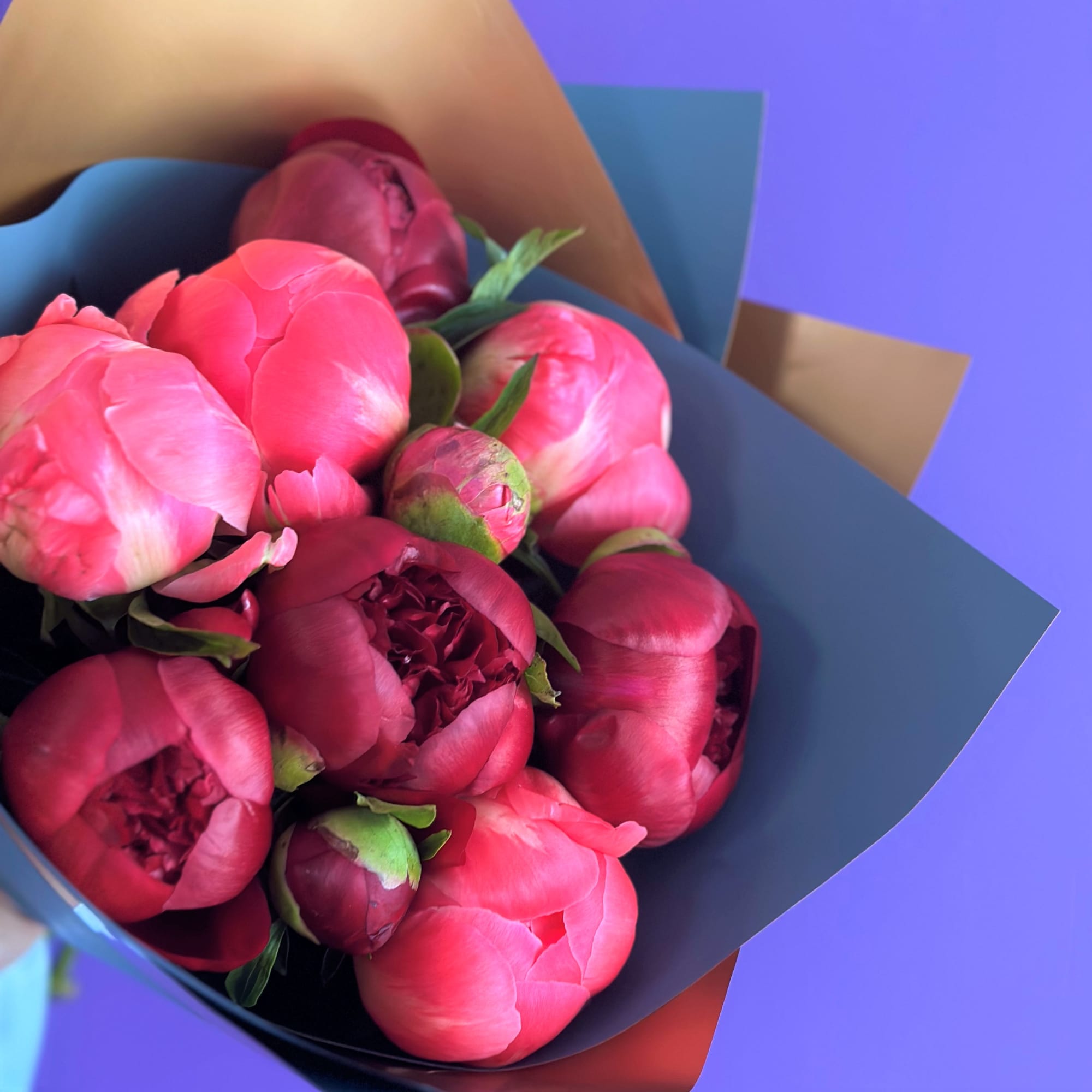 This arrangement is for peony lovers who appreciate beauty and style
Available in