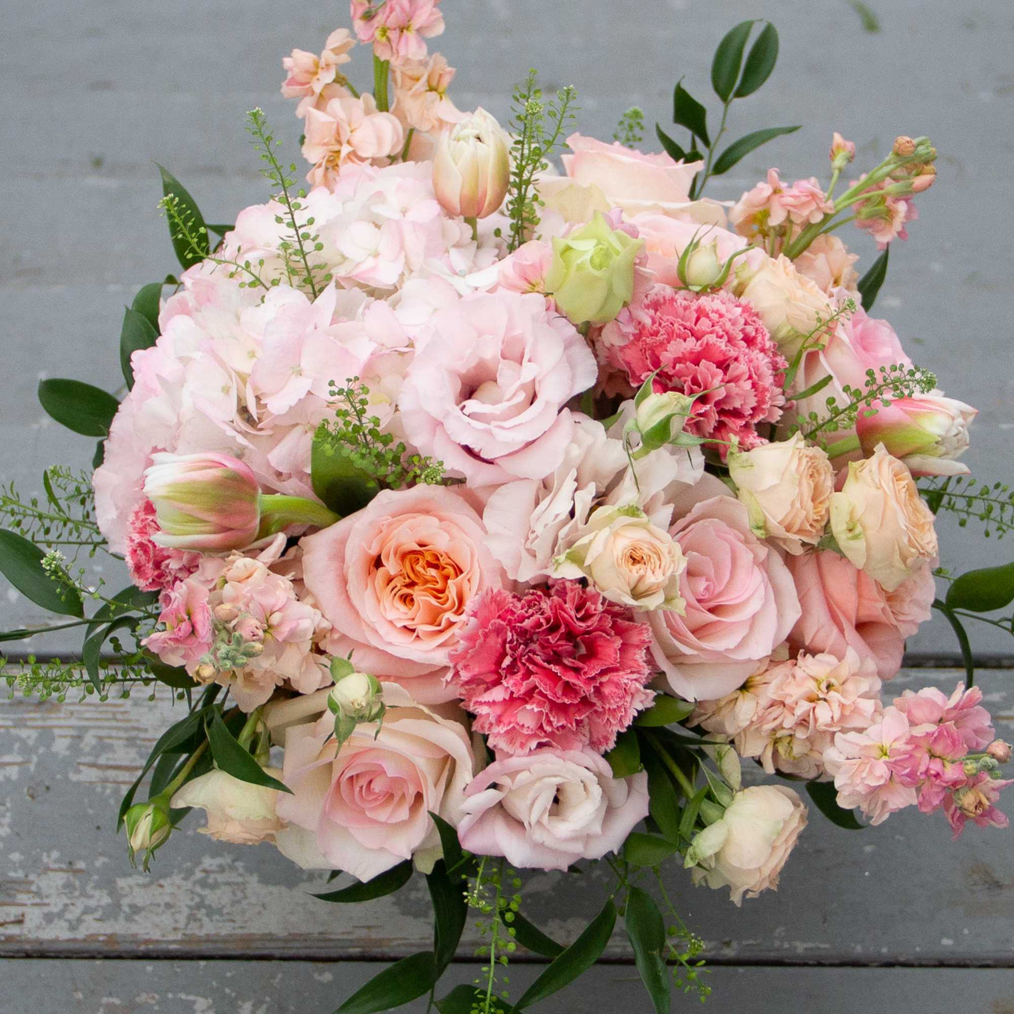 AVAILABLE VALENTINES WEEK ONLY! This special Valentines day arrangement features a variety