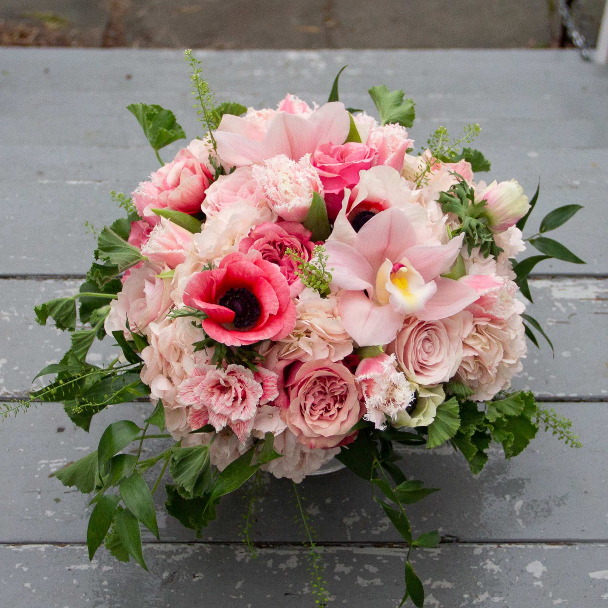 AVAILABLE VALENTINES WEEK ONLY! This special Valentines day arrangement features a variety