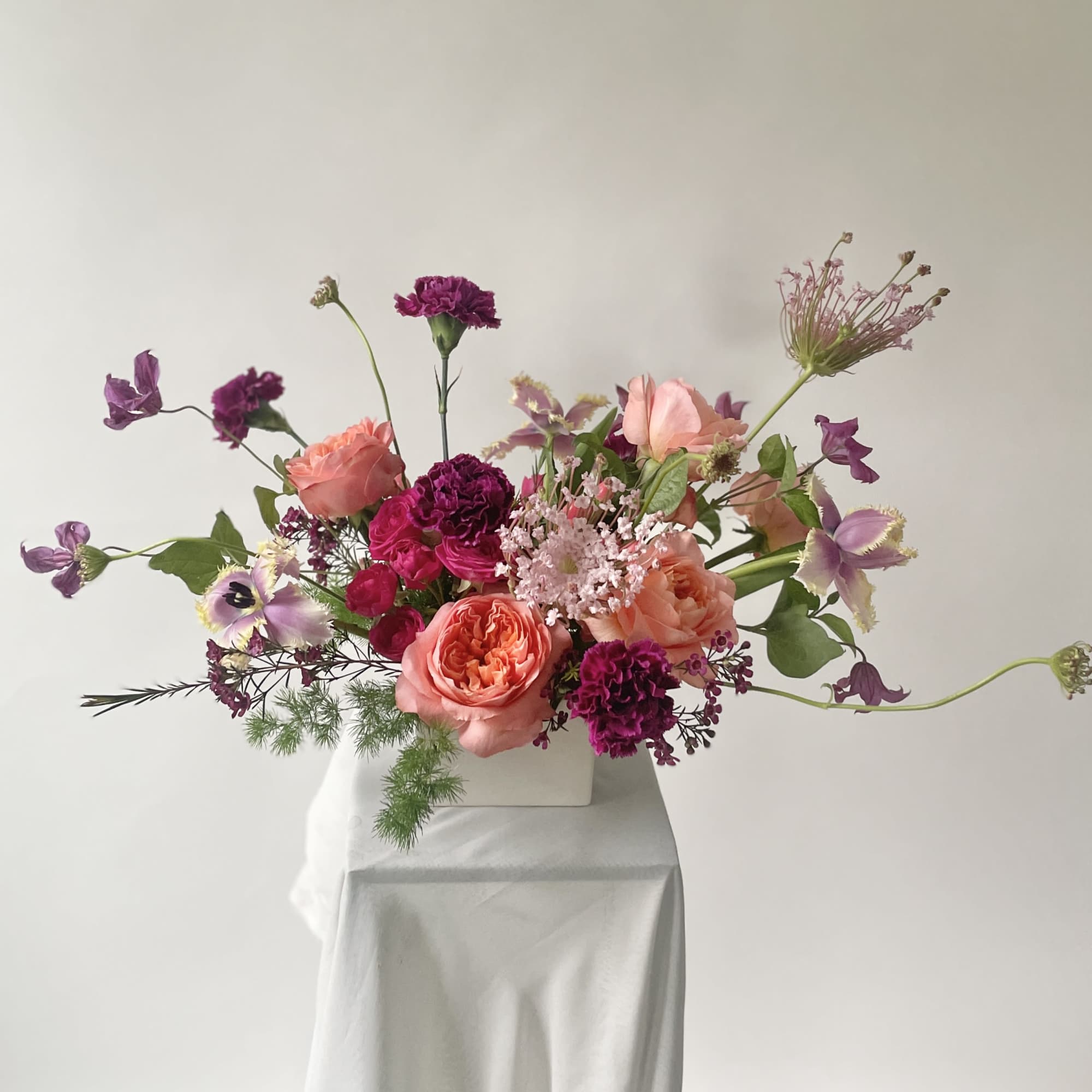 Vibrant, romantic, and full of personality, Berry Blossom is a floral arrangement