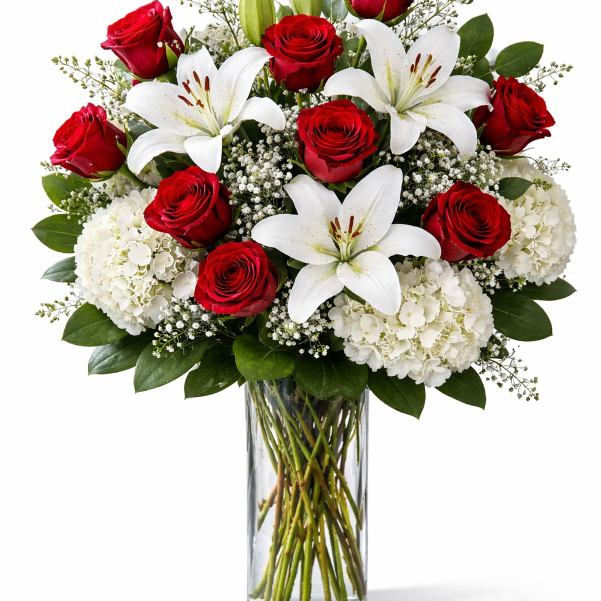 Twelve classic red roses are artfully paired with lush white hydrangea and