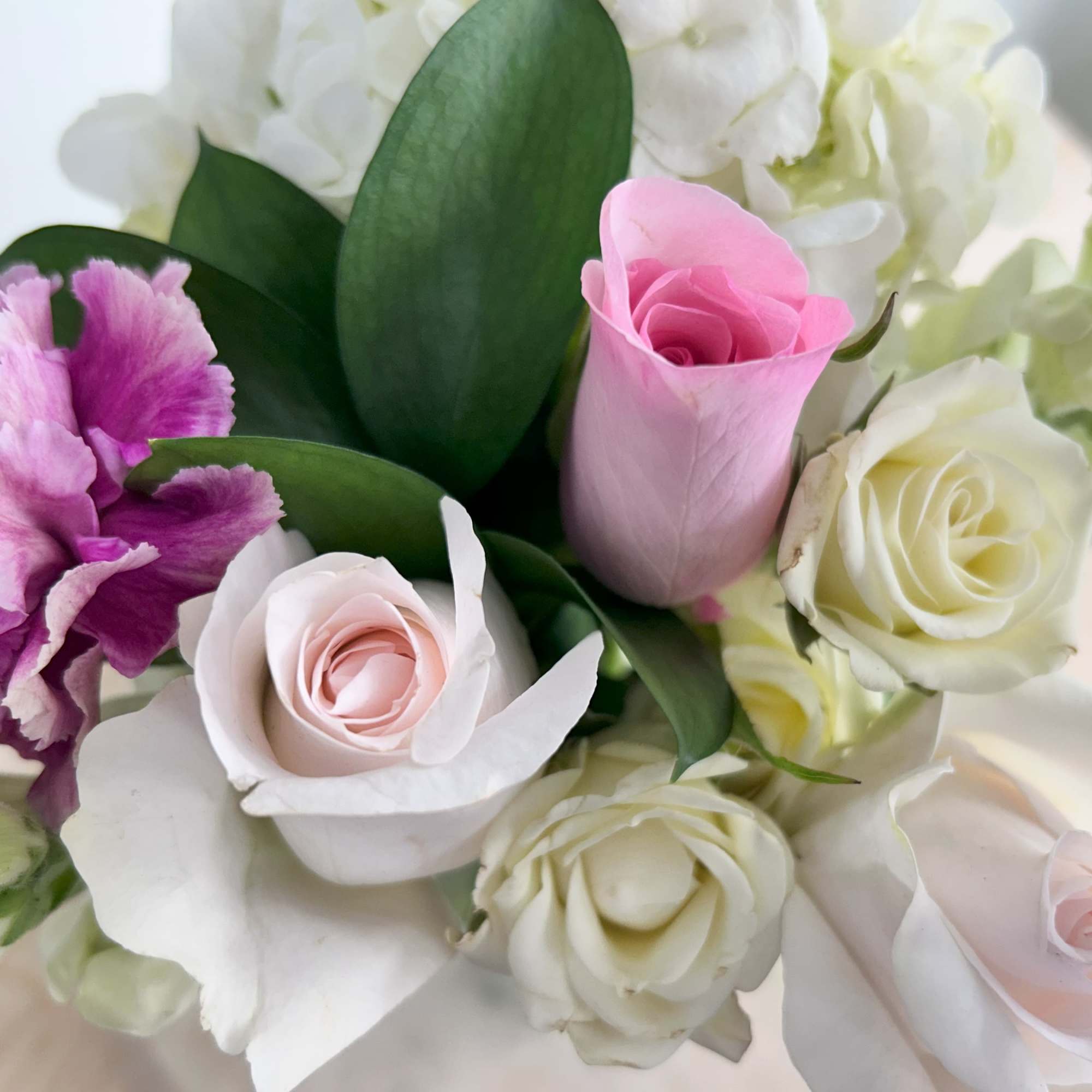 We will make your custom mixed flower arrangement using the quality flowers
