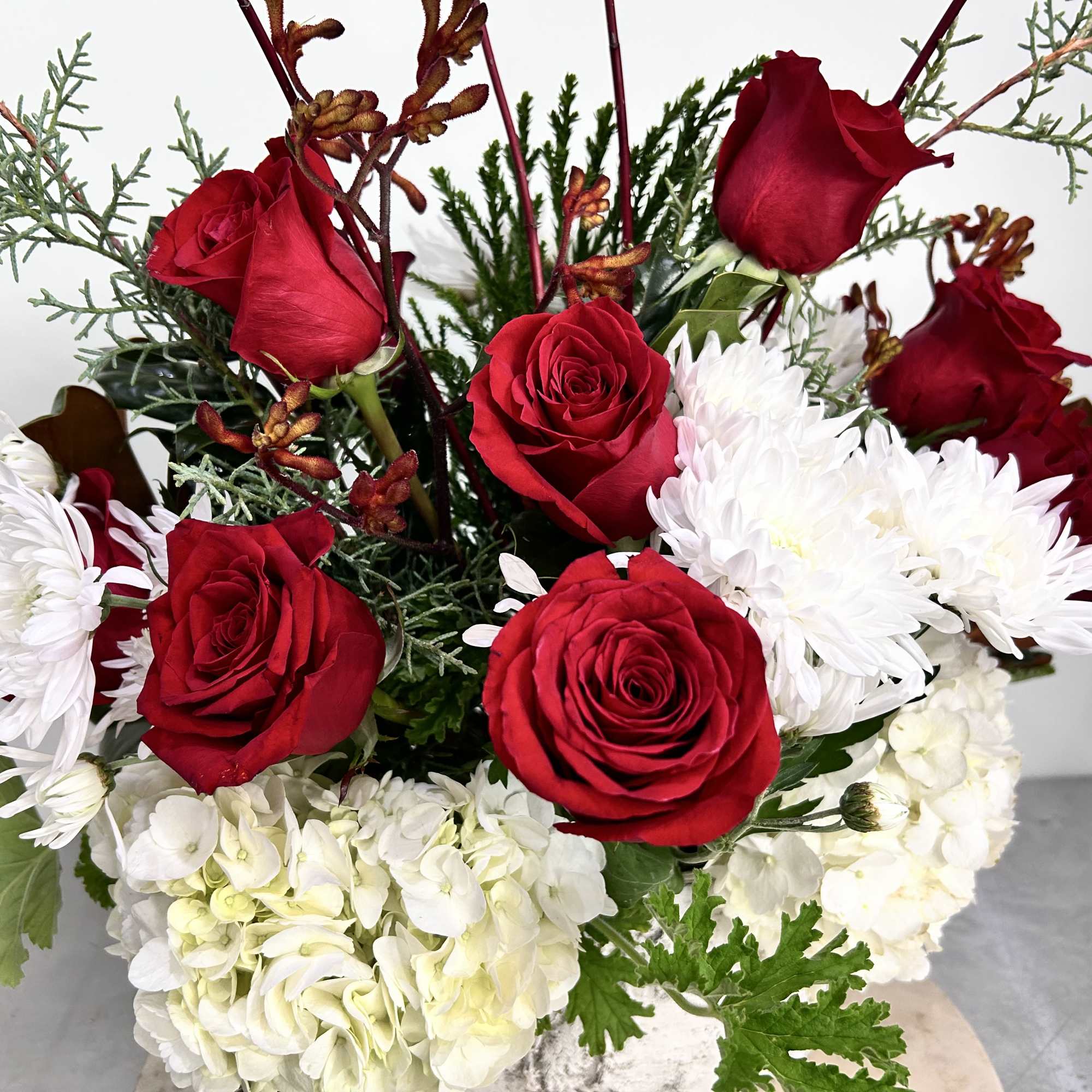 A beautiful birch oval vase with fresh seasonal flowers.  