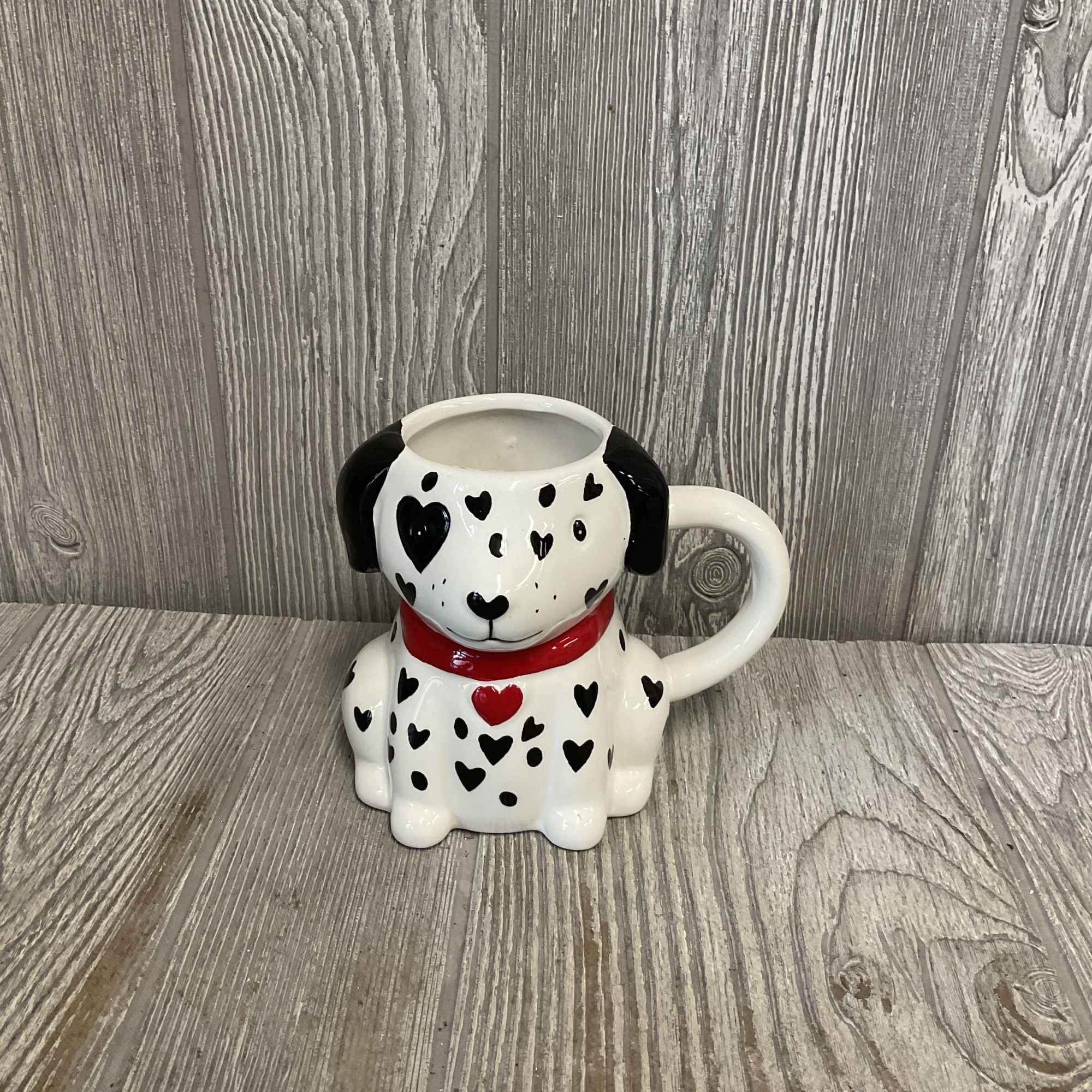 Beautiful fresh cut red roses arranged in an adorable keepsake ceramic Valentine&rsquo;s