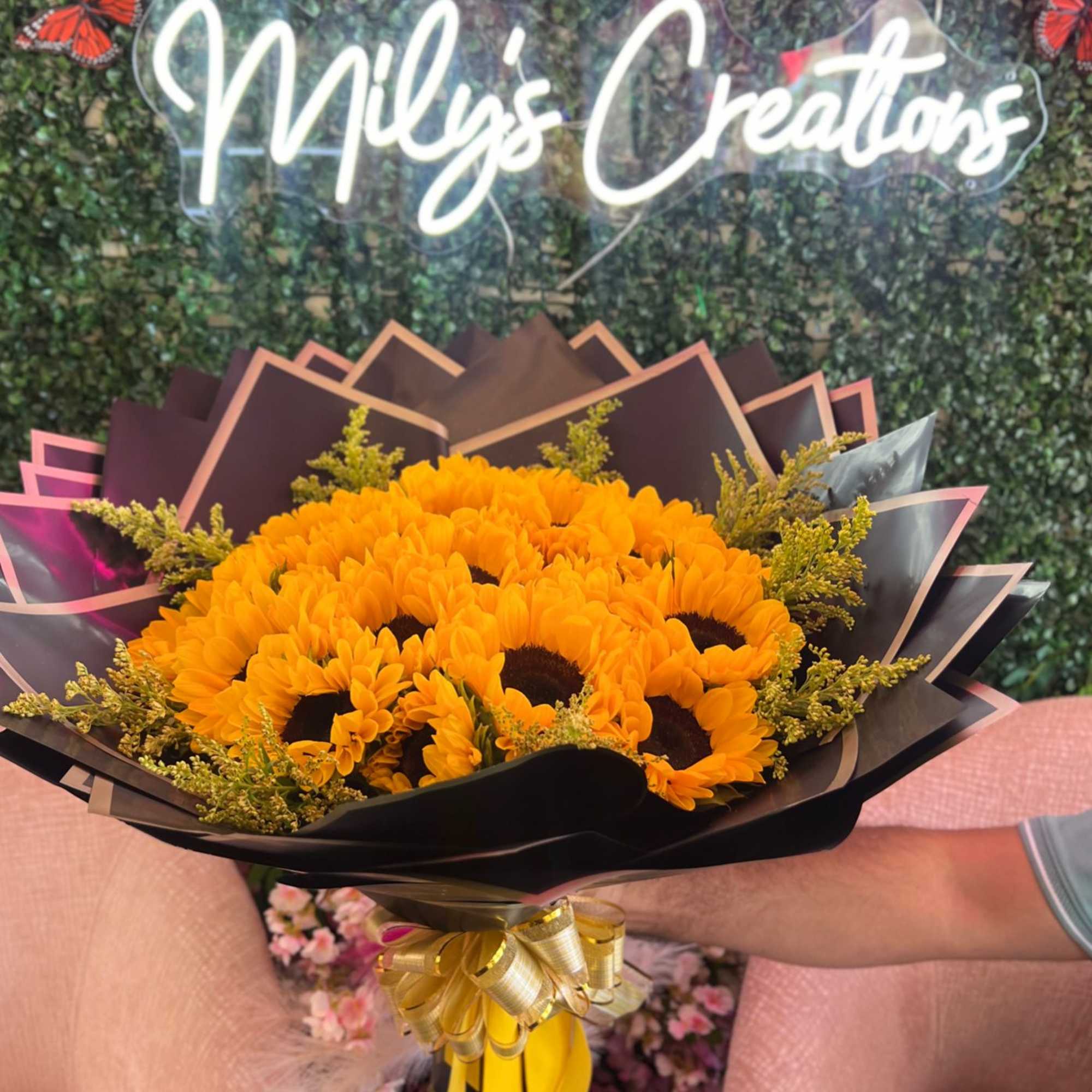 Thoughtful selection of sunflowers and warm-toned flowers that capture the essence of