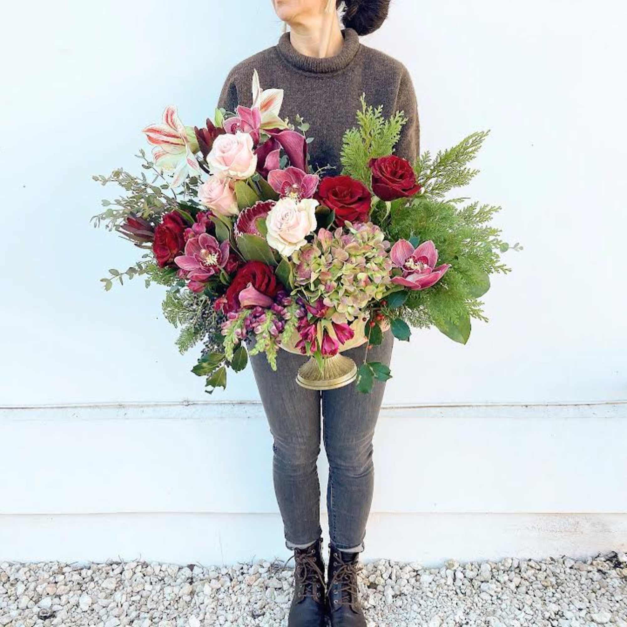 A beautiful collection of unique blooms with pink ice protea, candy-cane peppermint